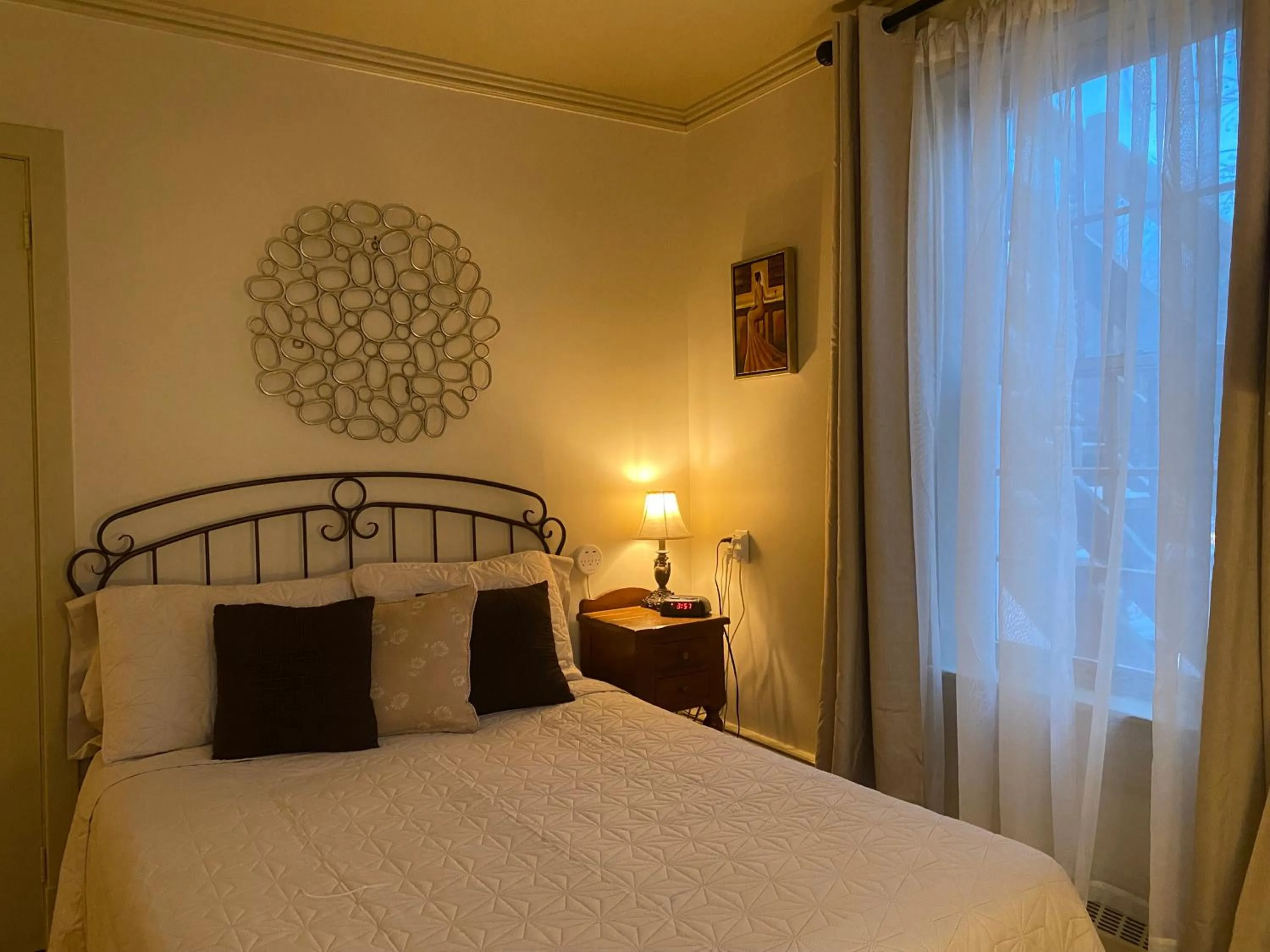 Bed in Au Manoir de la rue Merry