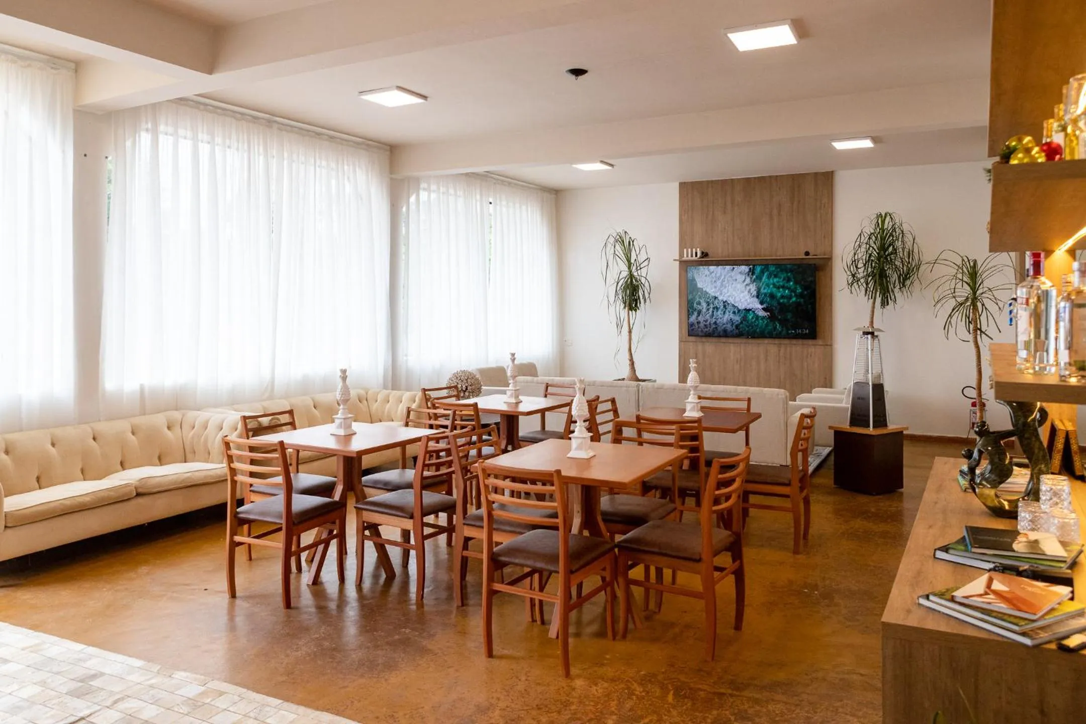 Communal lounge/ TV room in Pousada de Charme Vila Natal