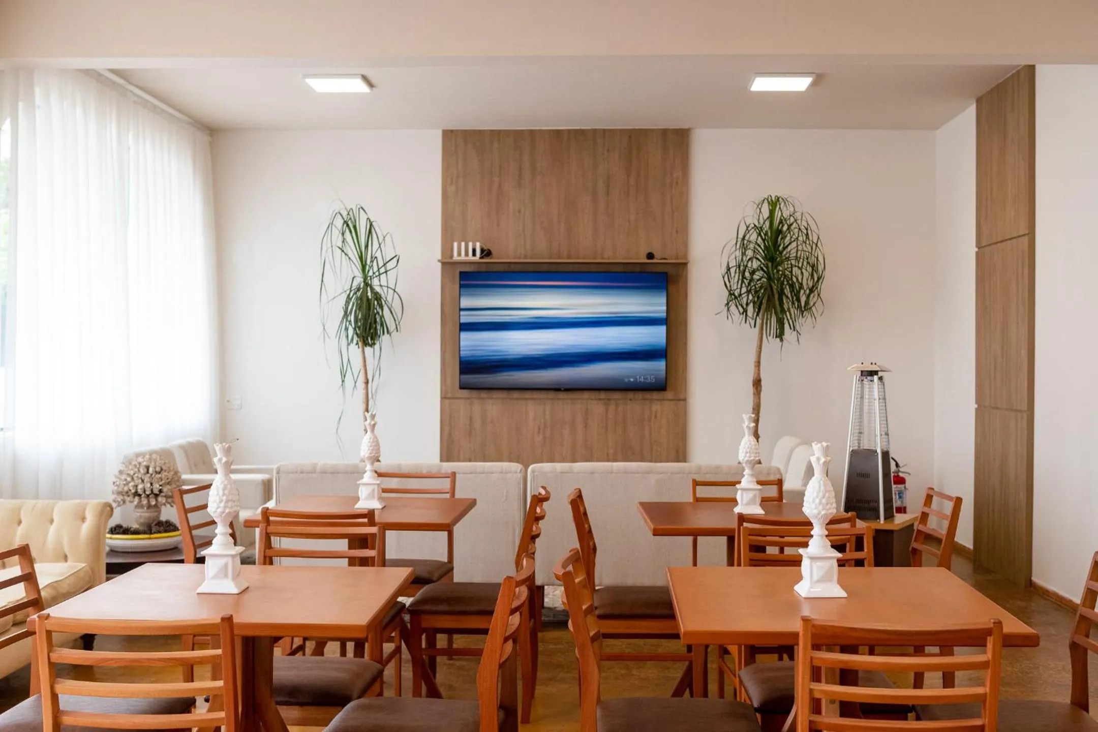 Communal lounge/ TV room in Pousada de Charme Vila Natal