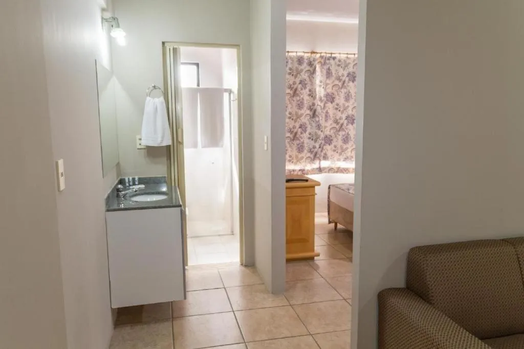 Bedroom in Maria Quitéria Hotel & Flat