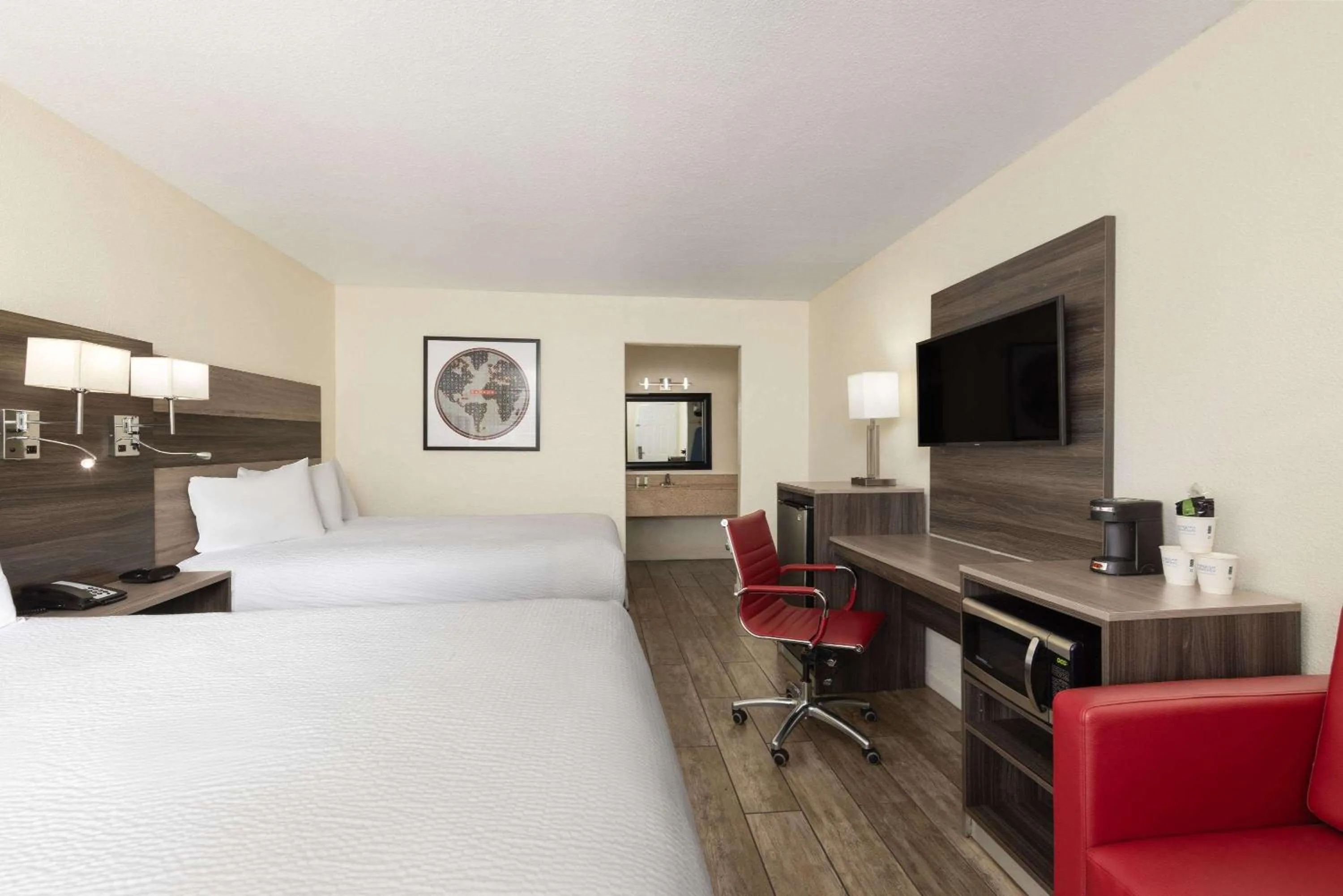 Photo of the whole room, Bed in Ramada by Wyndham Kingman