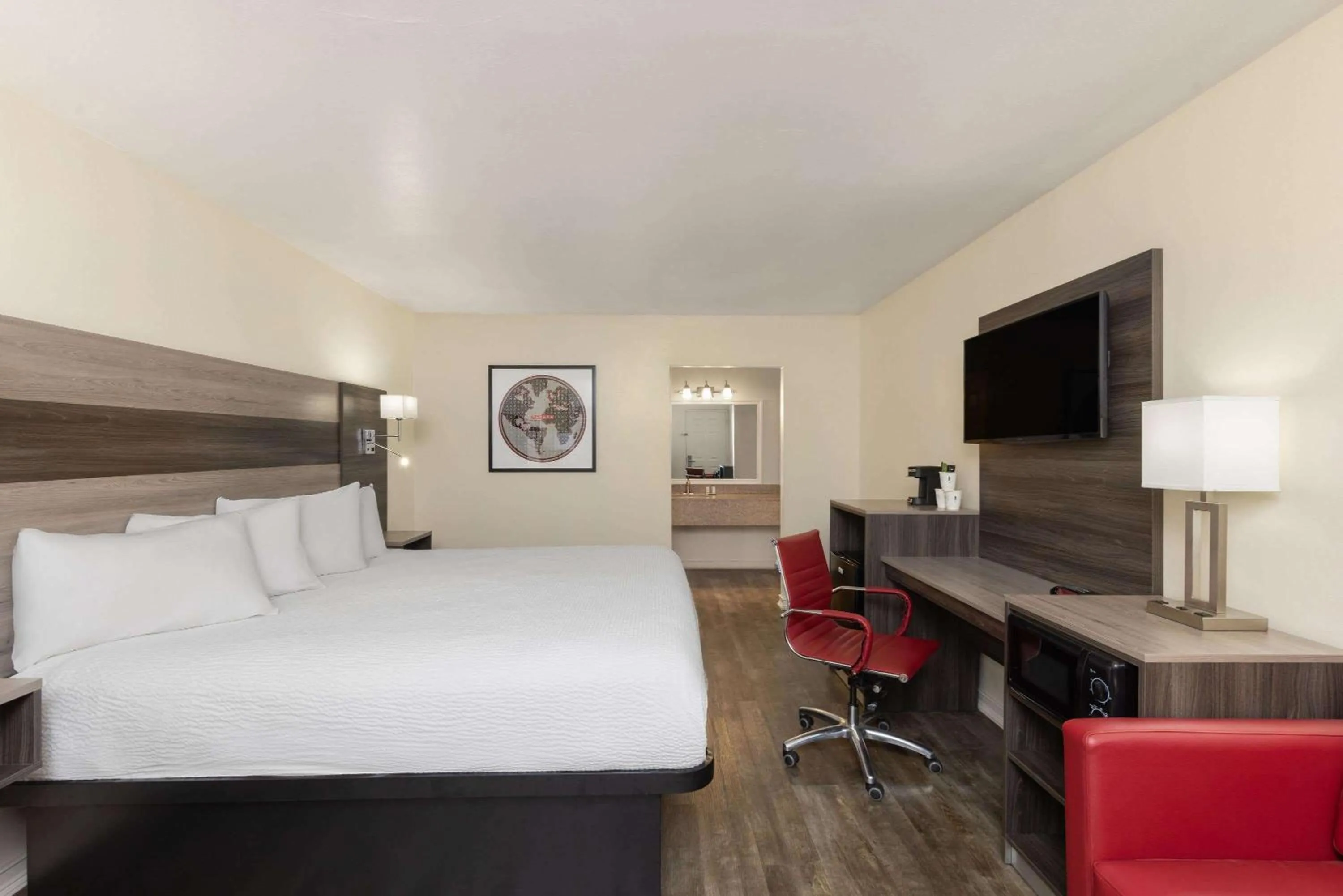 Photo of the whole room, Bed in Ramada by Wyndham Kingman