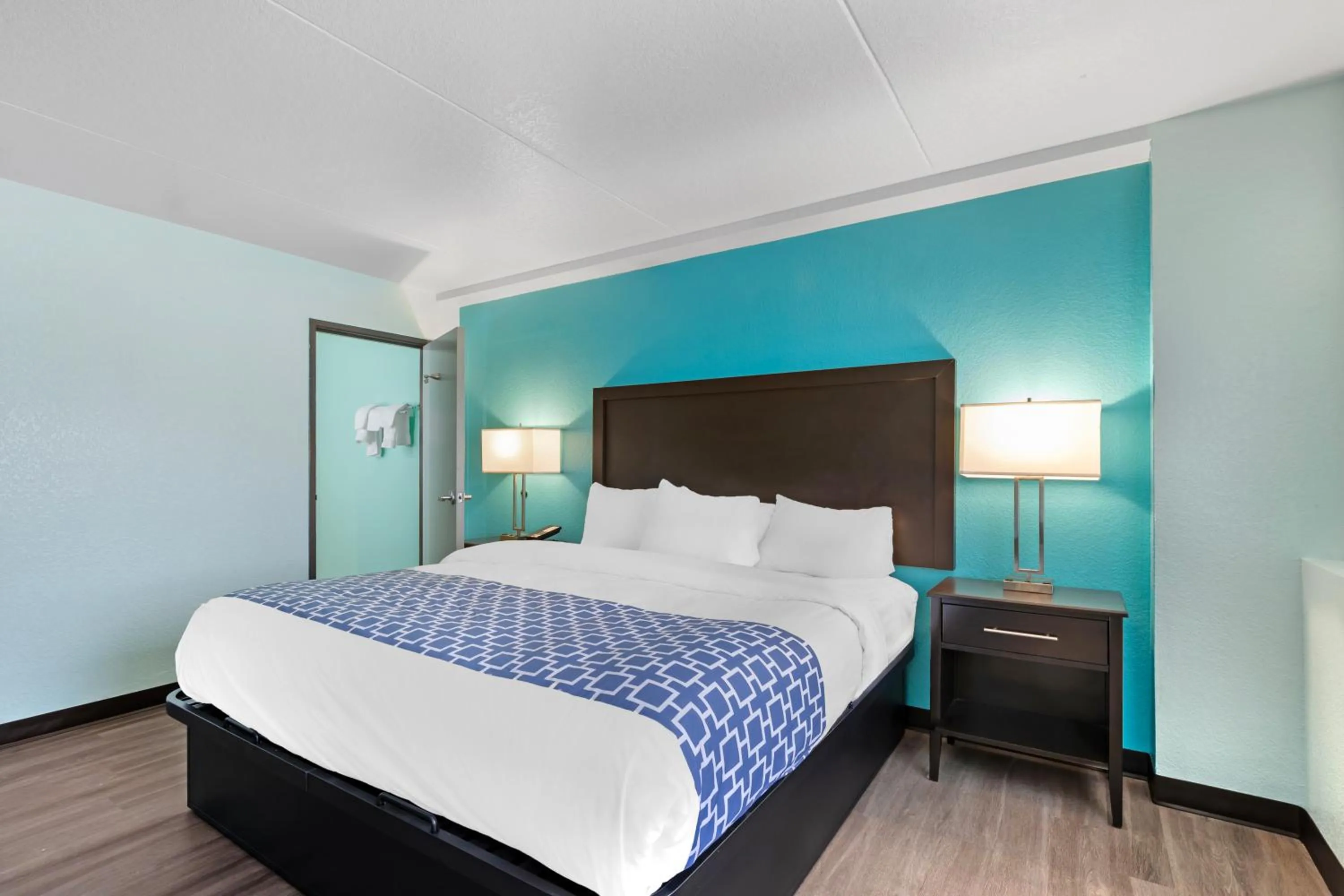Bed in Ramada by Wyndham Des Moines Airport