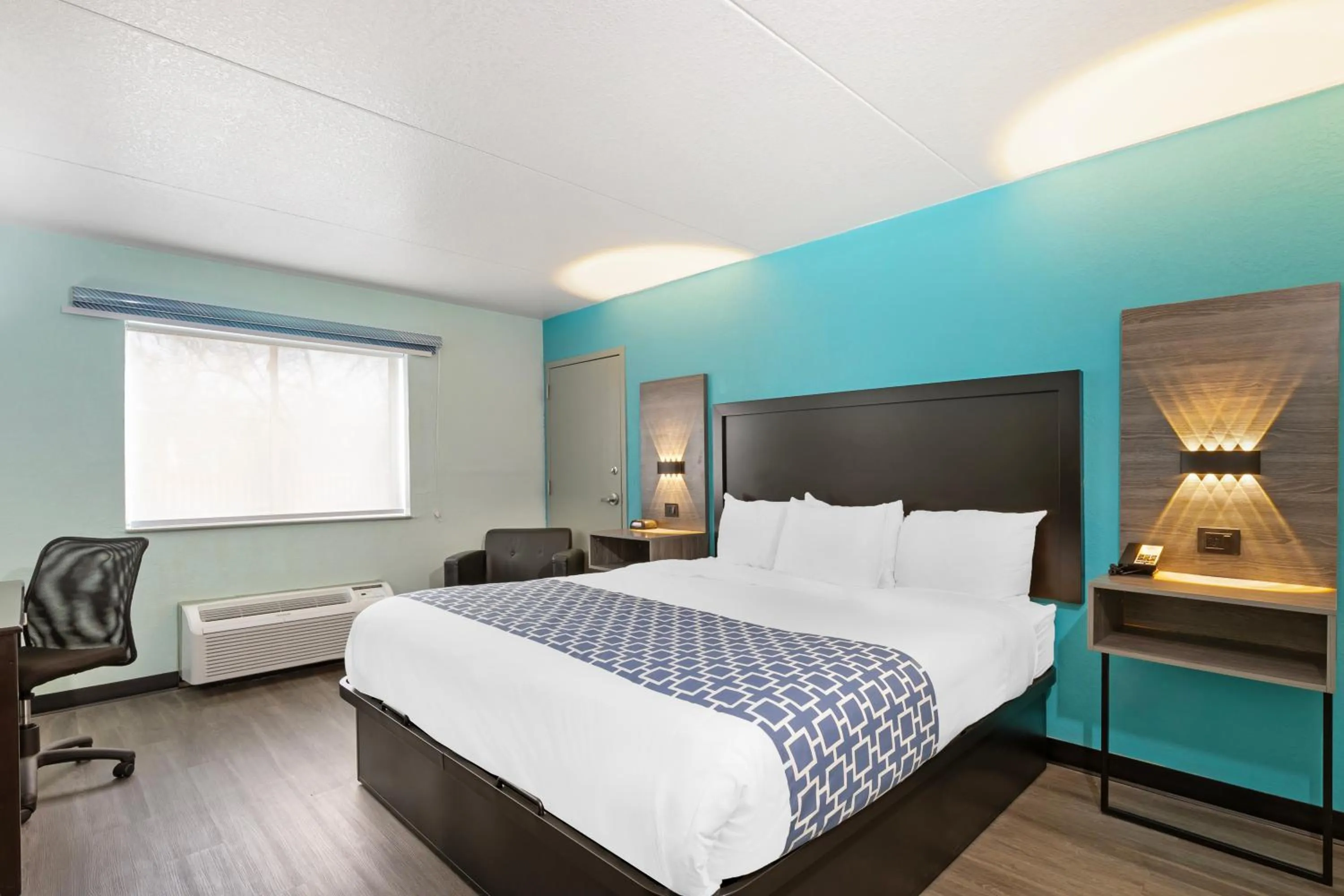 Bed in Ramada by Wyndham Des Moines Airport