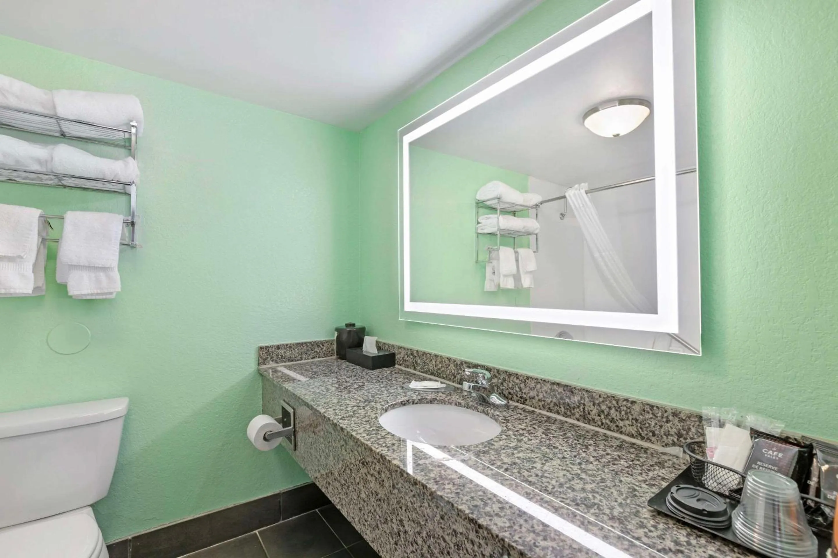 Bedroom in Ramada by Wyndham Des Moines Airport