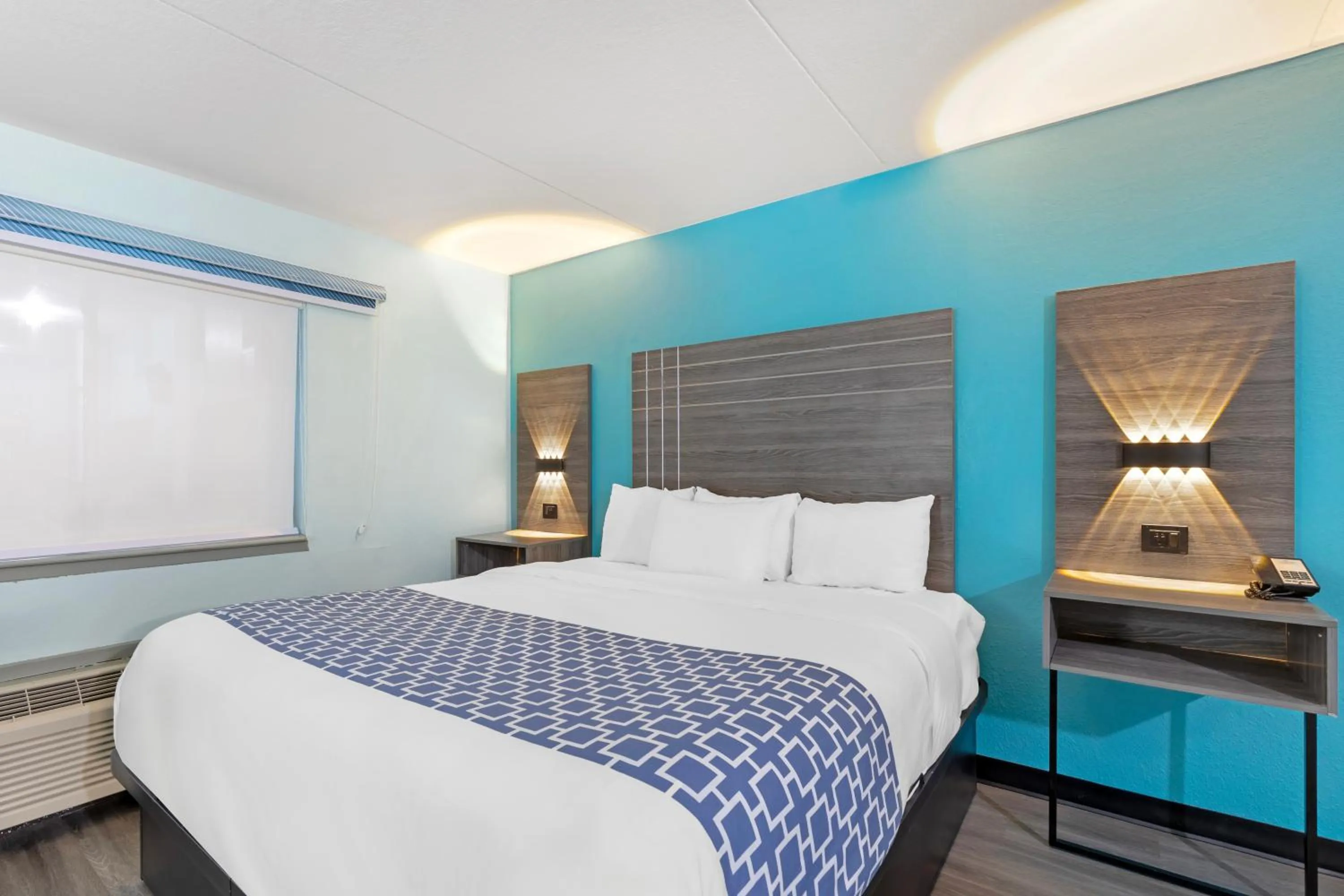 Bed in Ramada by Wyndham Des Moines Airport