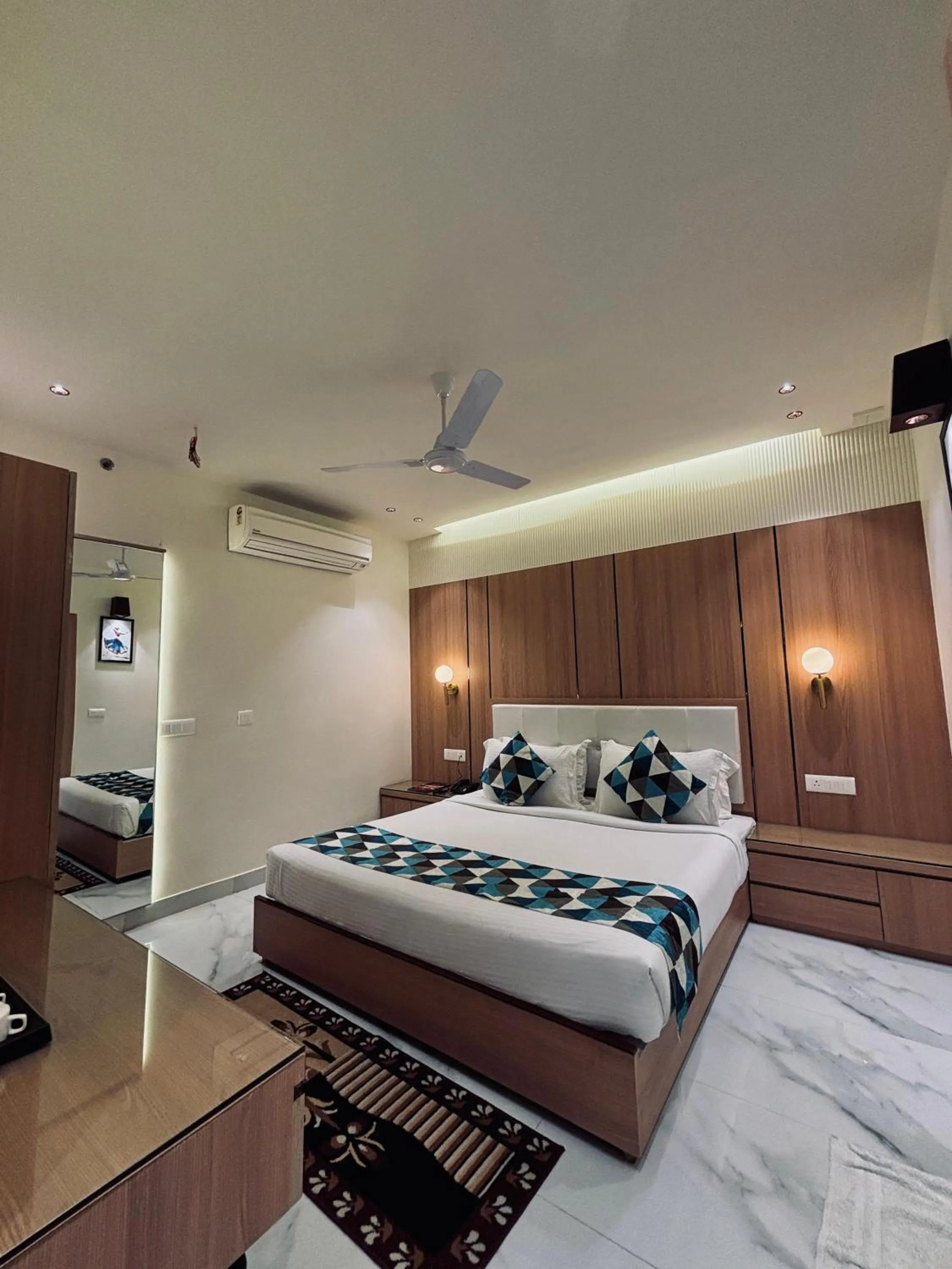 Bed in Taj Inn Hotel