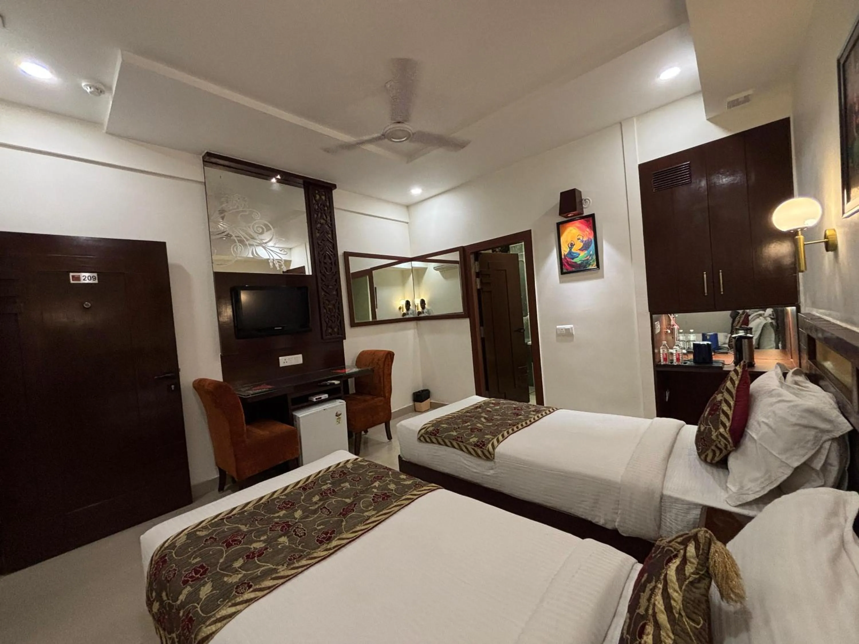 Bed in Taj Inn Hotel