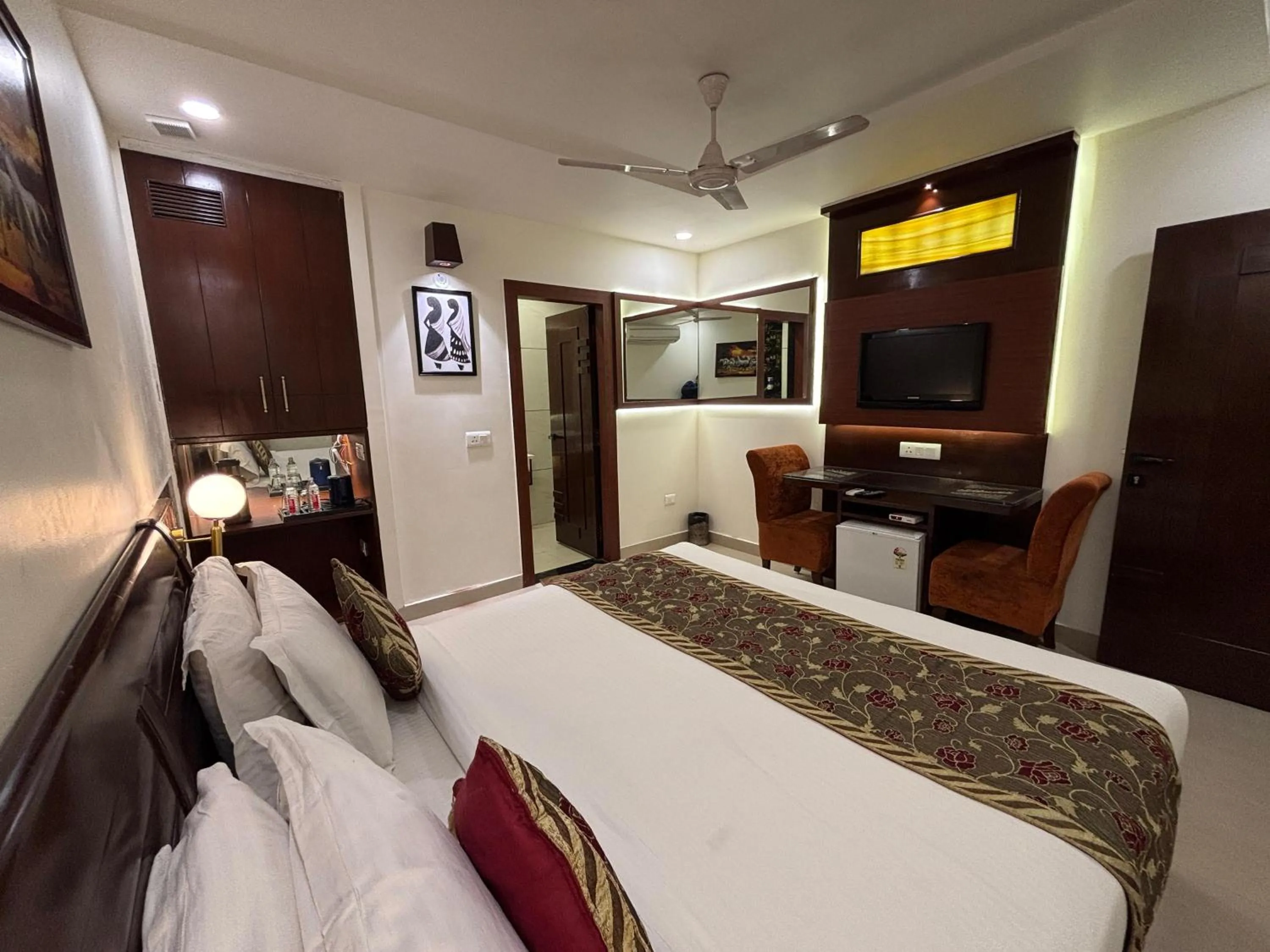 Bed in Taj Inn Hotel