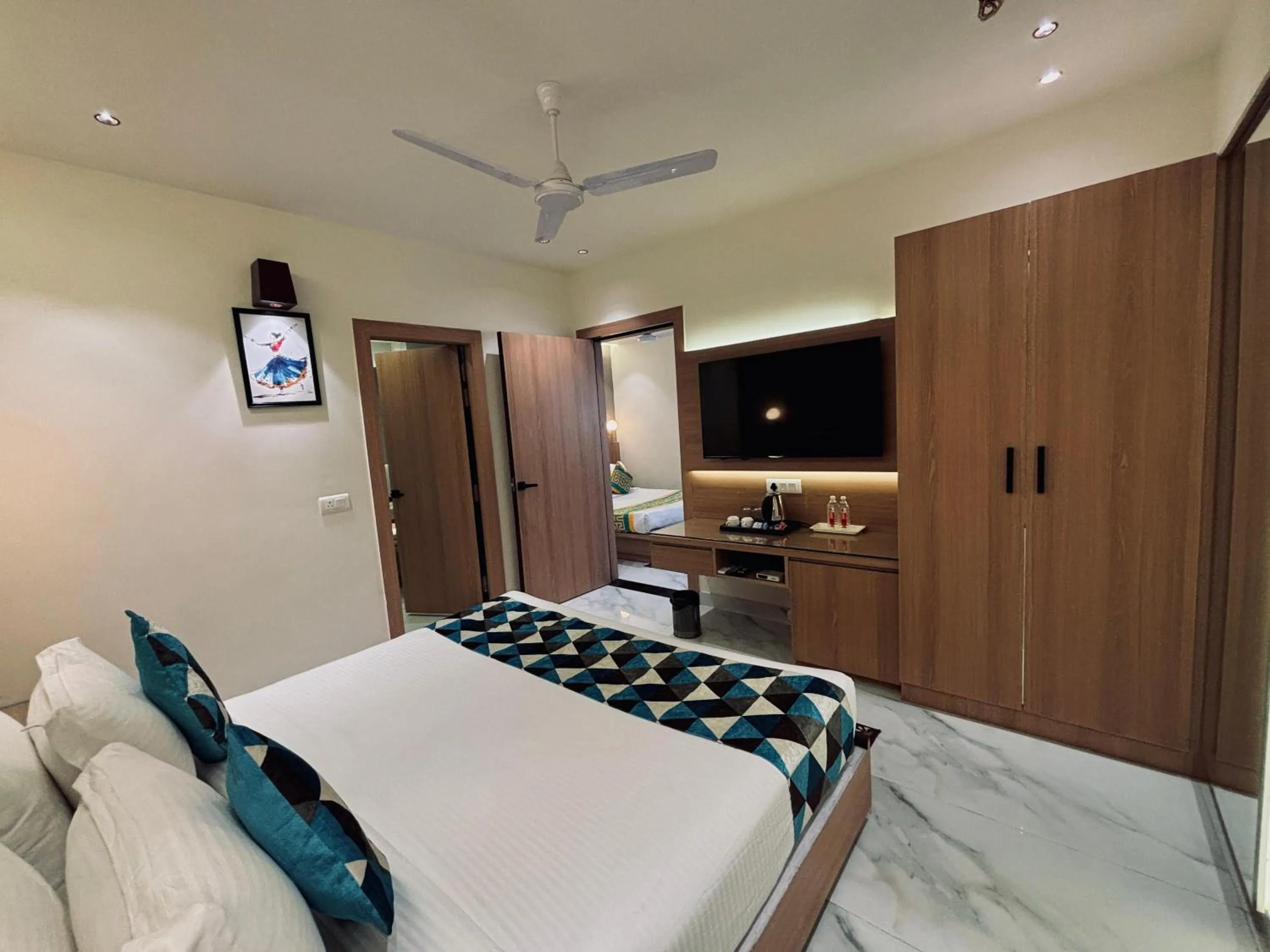 Bed in Taj Inn Hotel