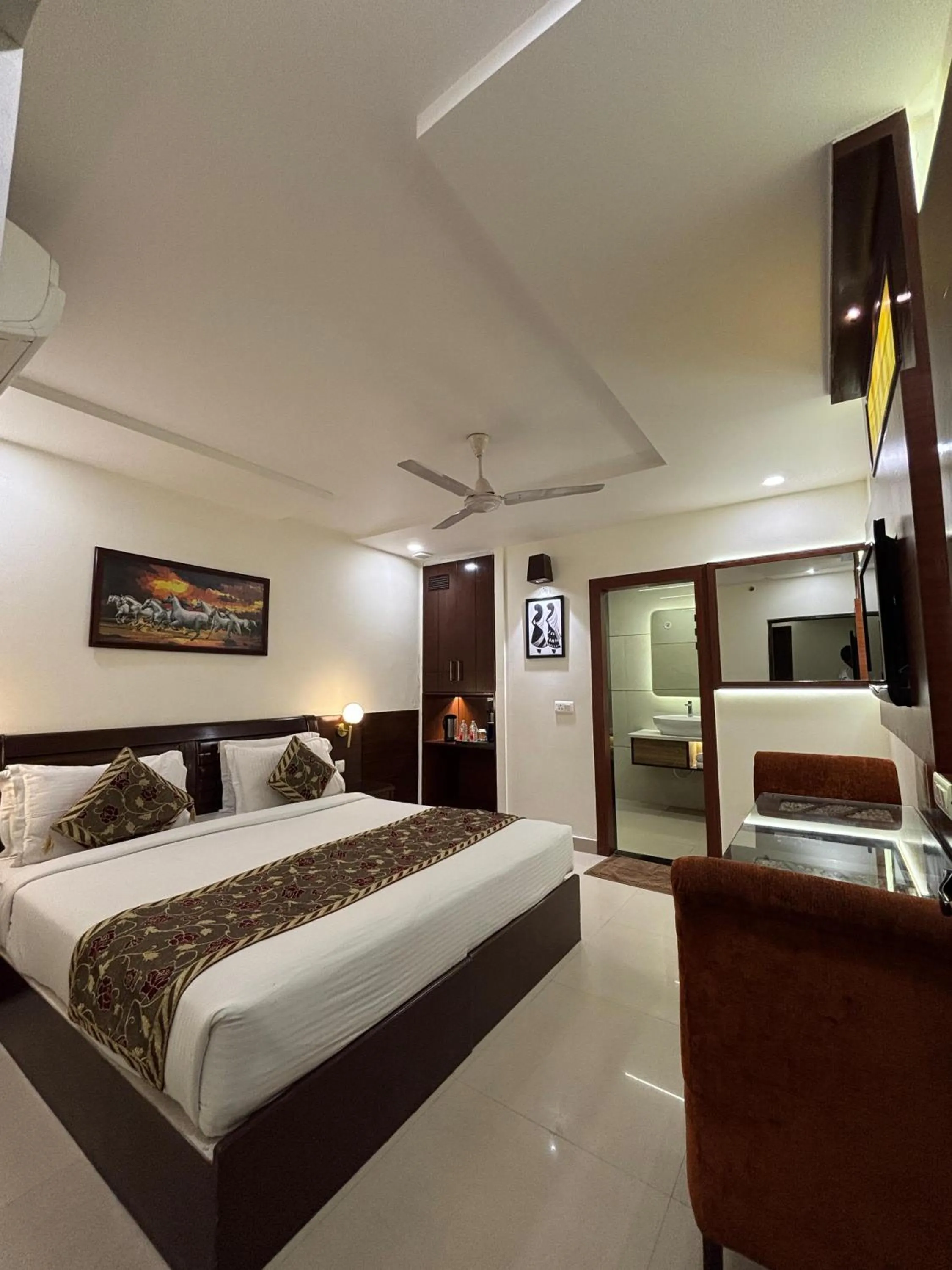 Bed in Taj Inn Hotel