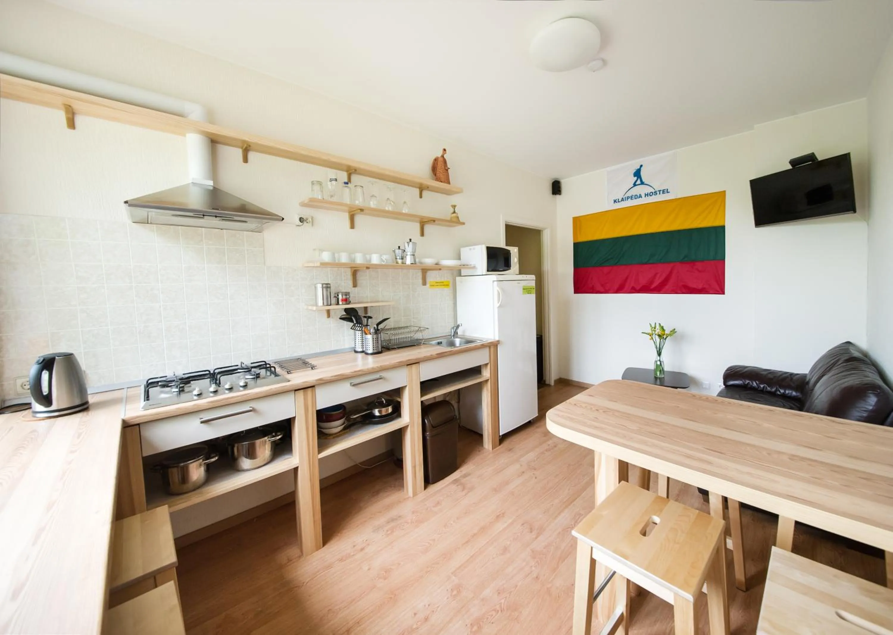 Communal lounge/ TV room in Klaipeda Hostel