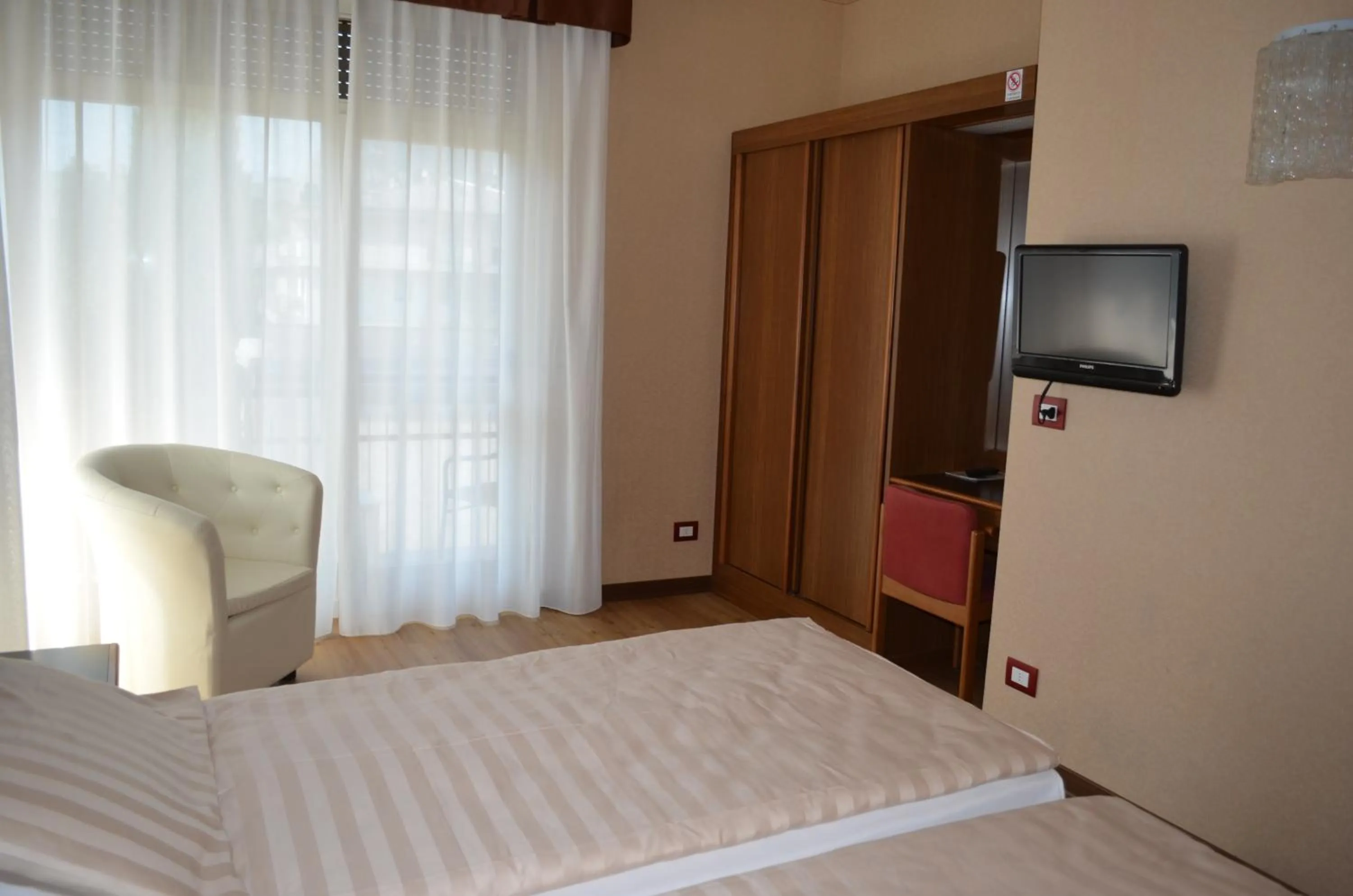 Bed in SunLake Hotel