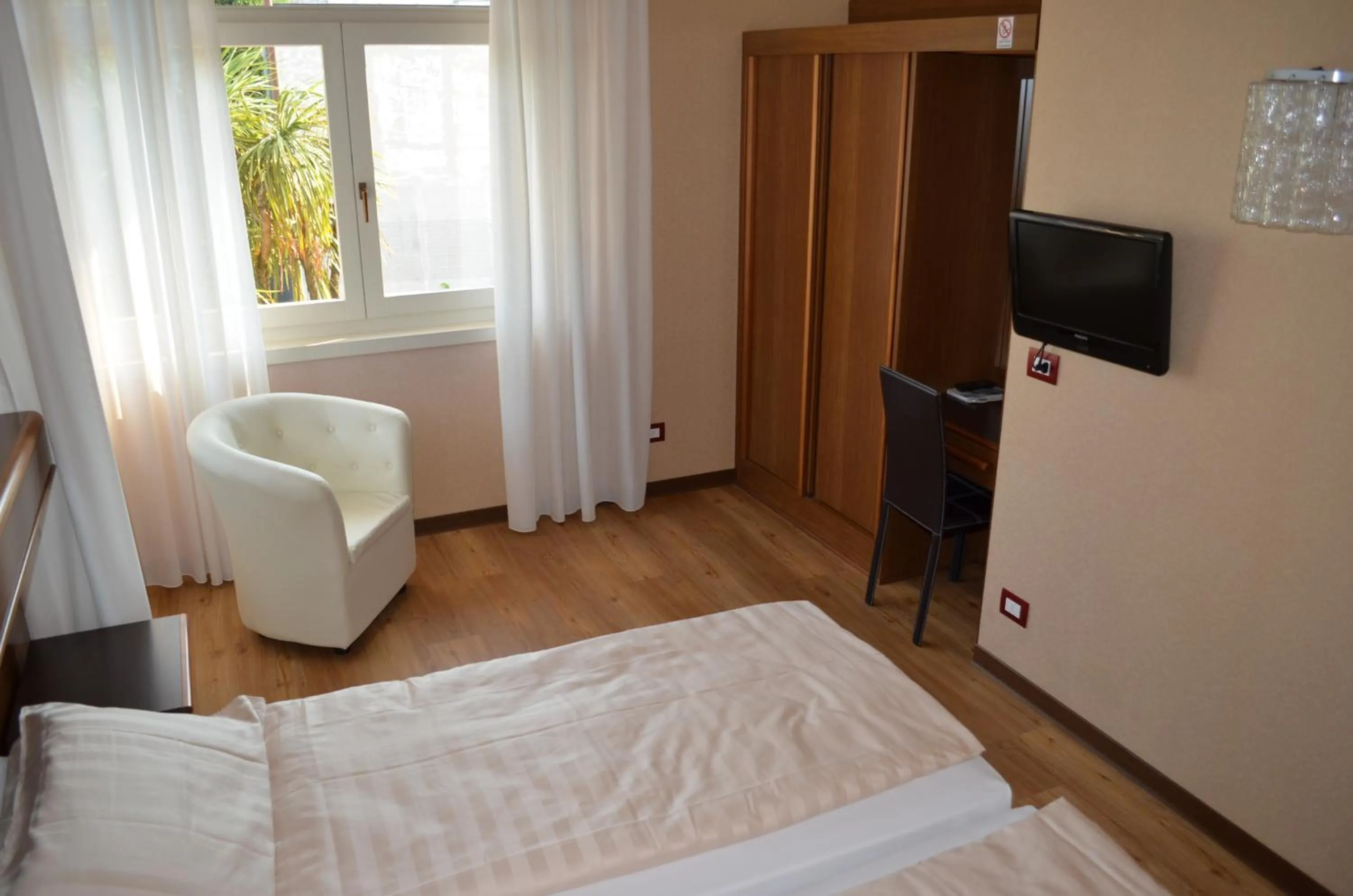 Bed in SunLake Hotel