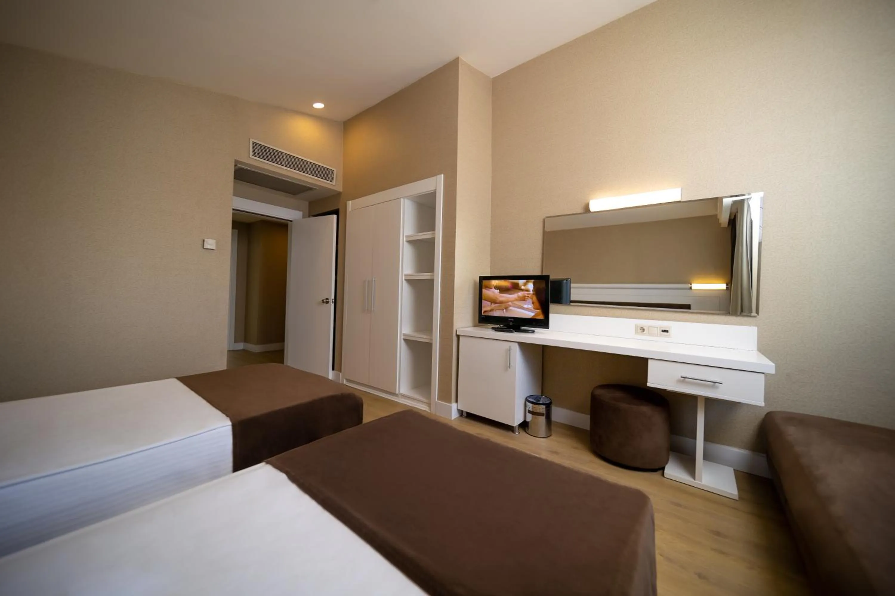 Bed in Sueno Hotels Beach Side