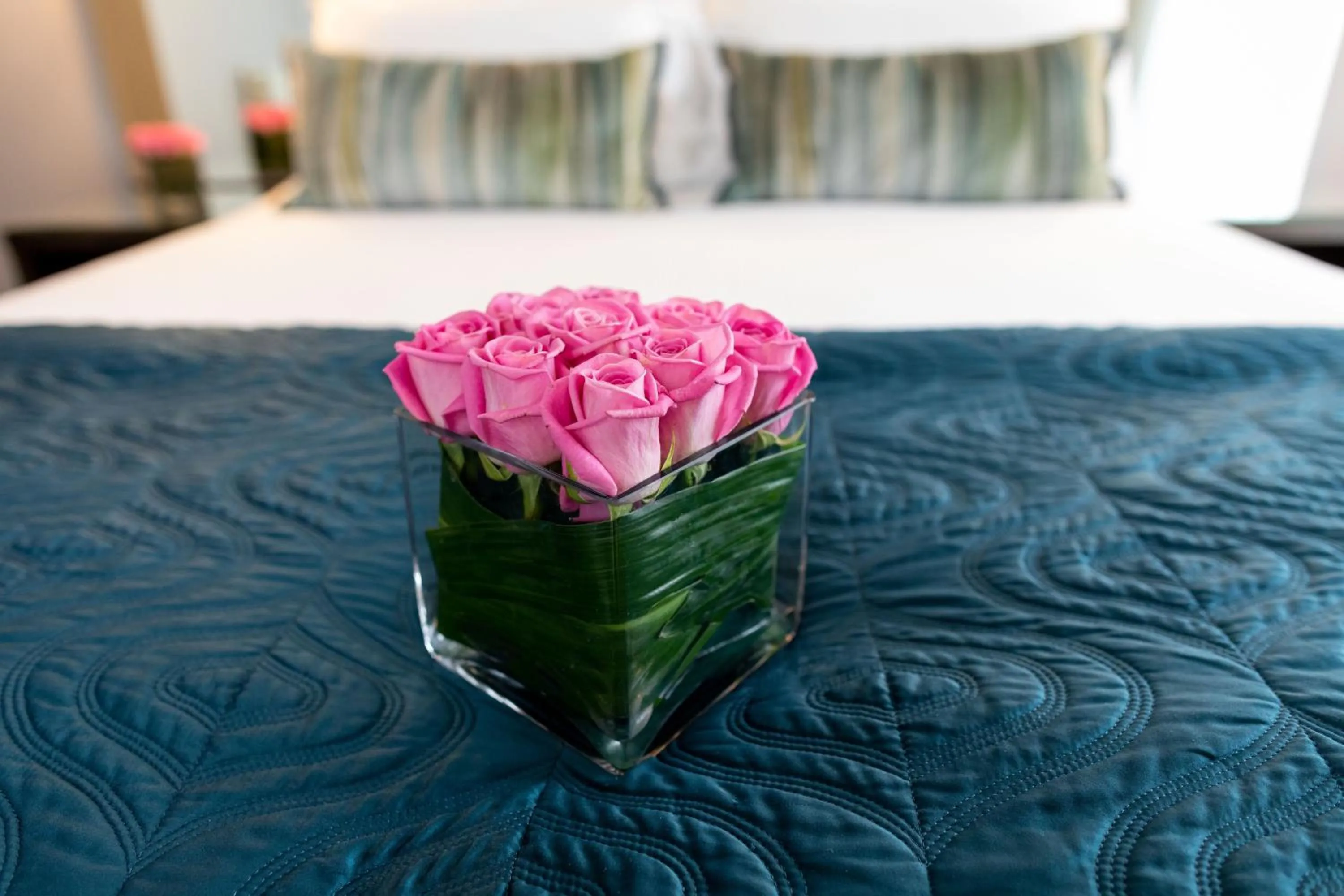 Bed in Zuni Restaurant & Boutique Hotel