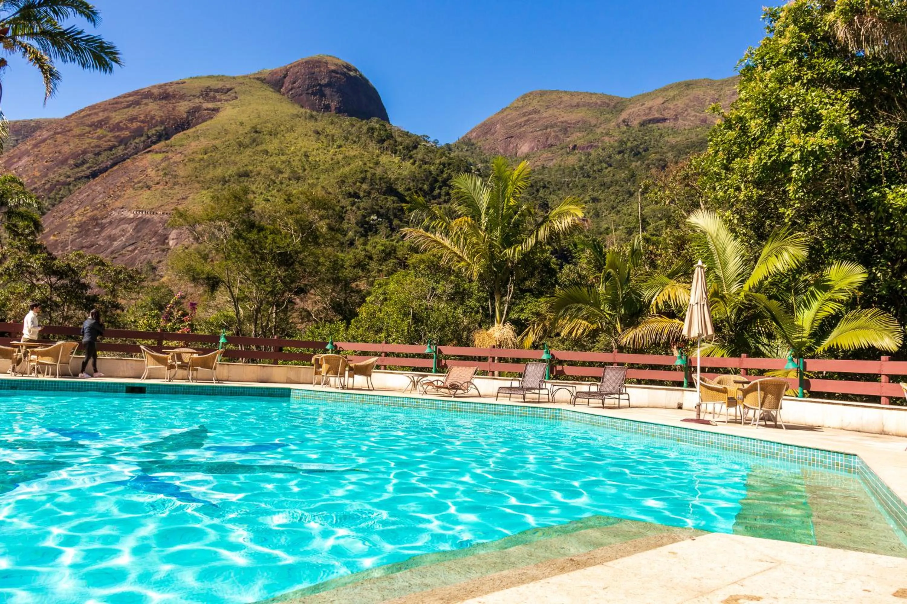 Swimming pool in Bomtempo II Chales by Castelo Itaipava