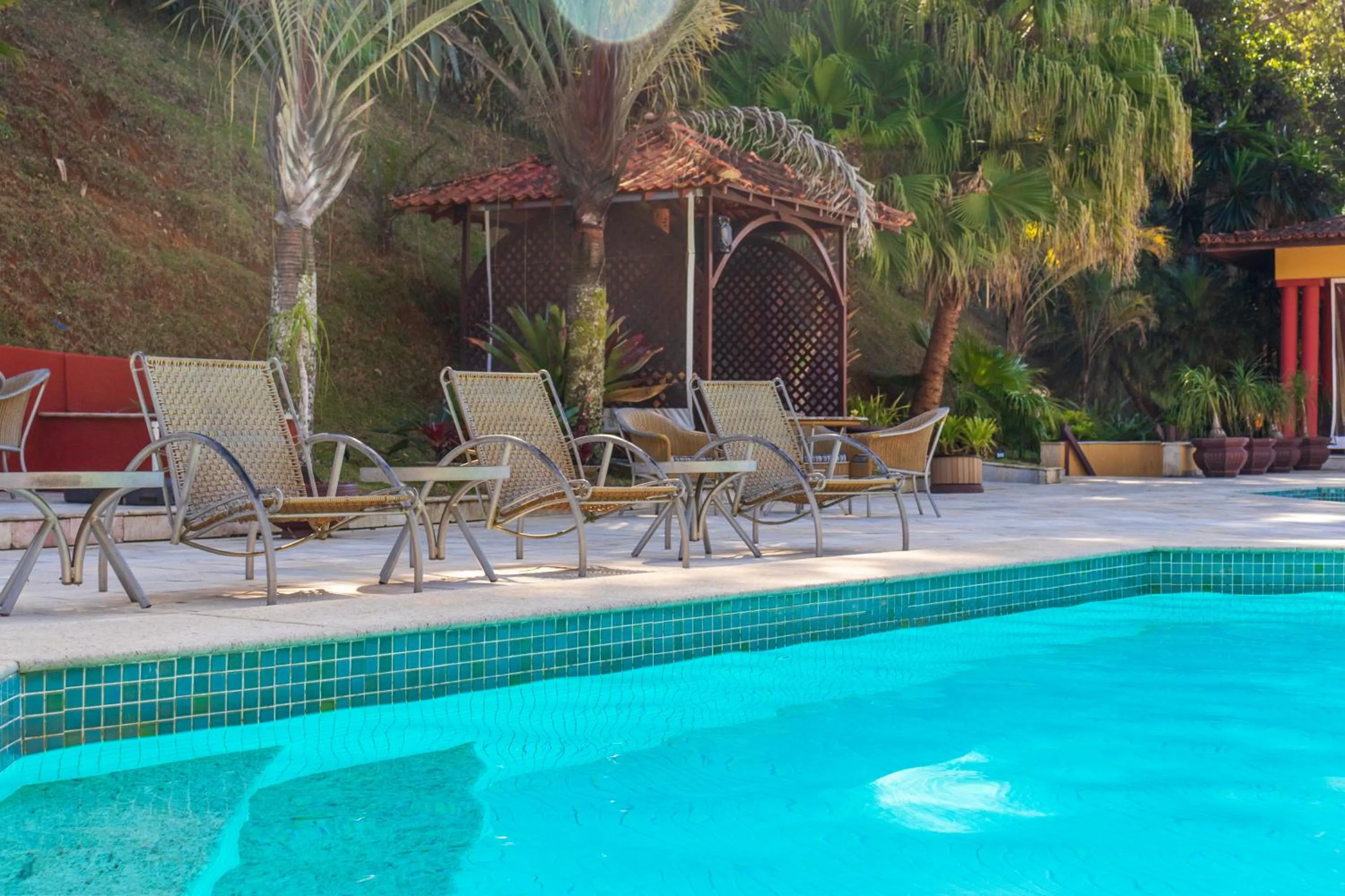 Swimming pool in Bomtempo II Chales by Castelo Itaipava