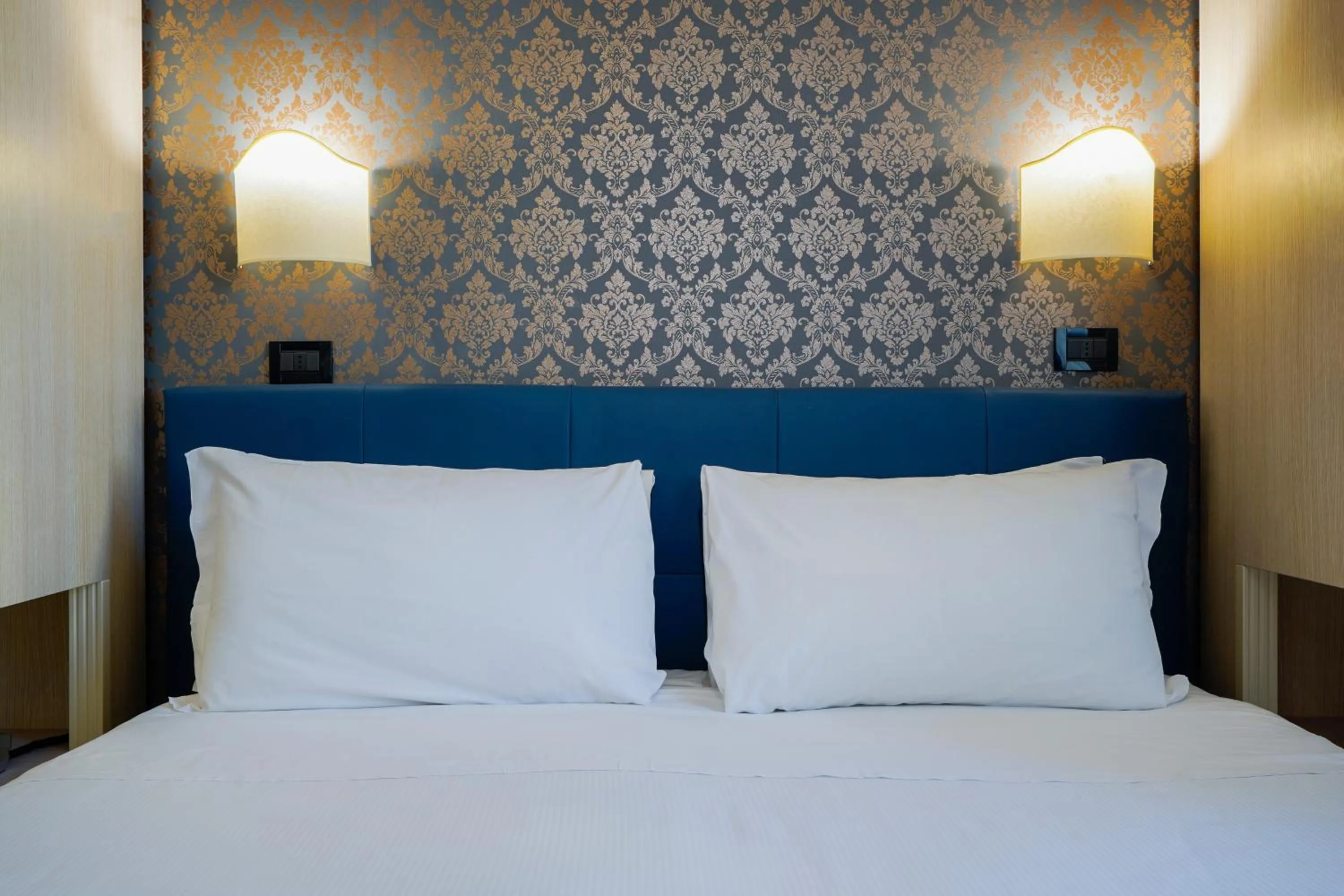 Bed in Hotel Panizza