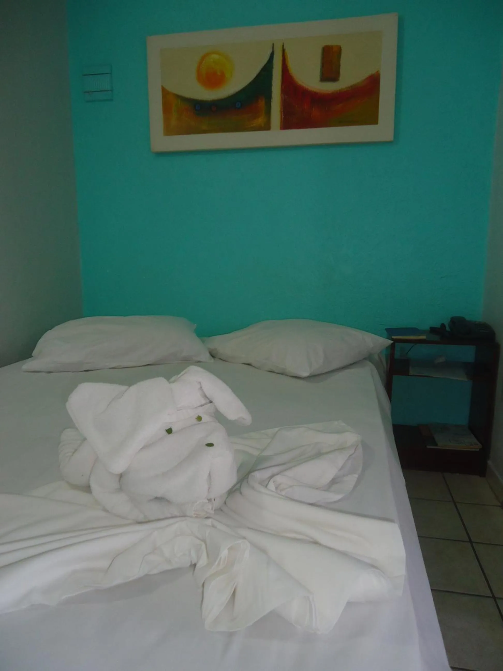 Bed in Pousada Nossa Casa