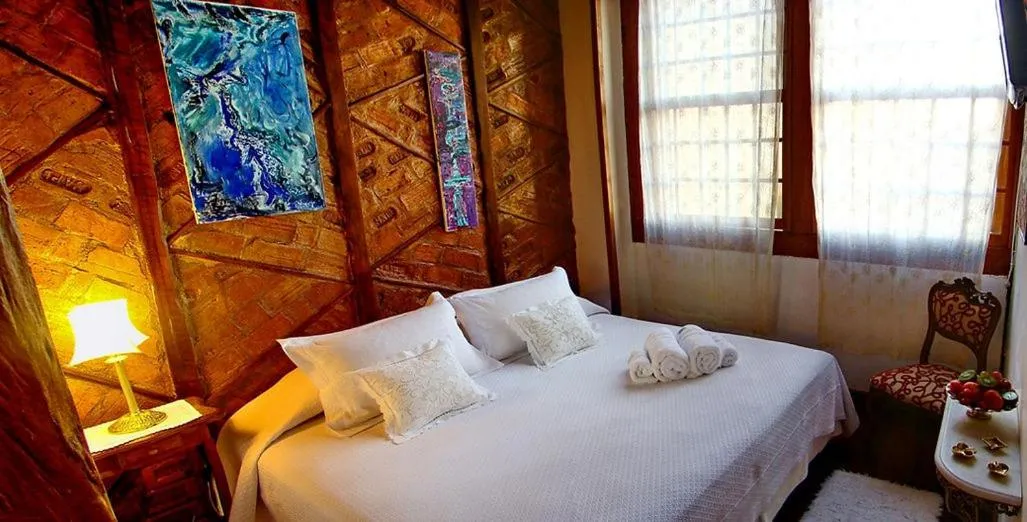 Bed in Pousada Arte Urquijo