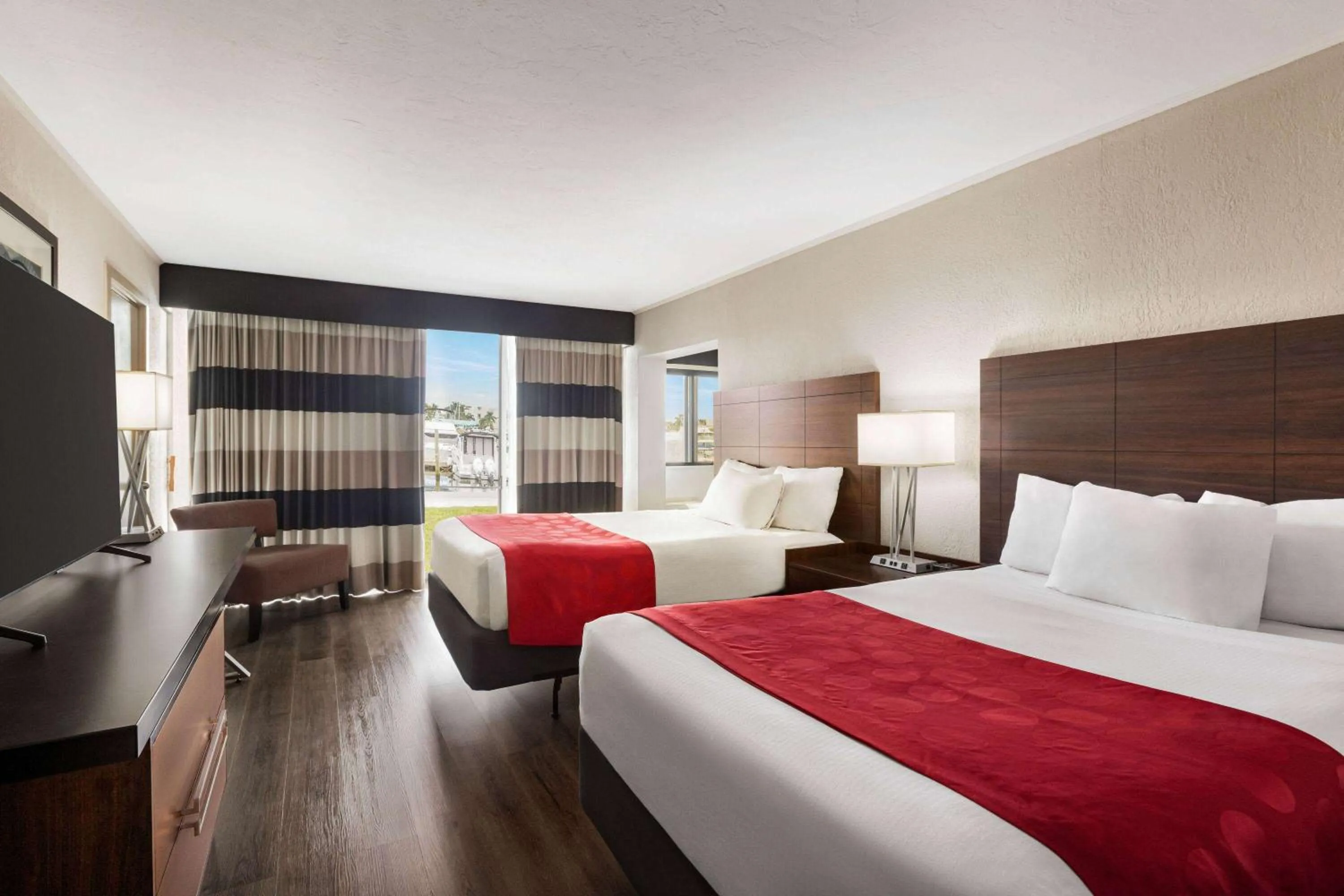 Photo of the whole room, Bed in Ramada by Wyndham Sarasota Waterfront