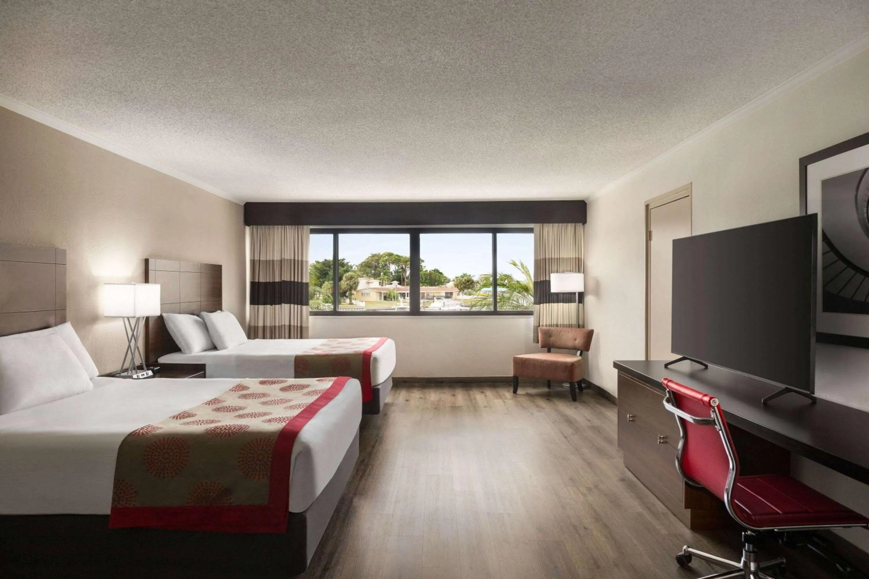 Photo of the whole room, Bed in Ramada by Wyndham Sarasota Waterfront