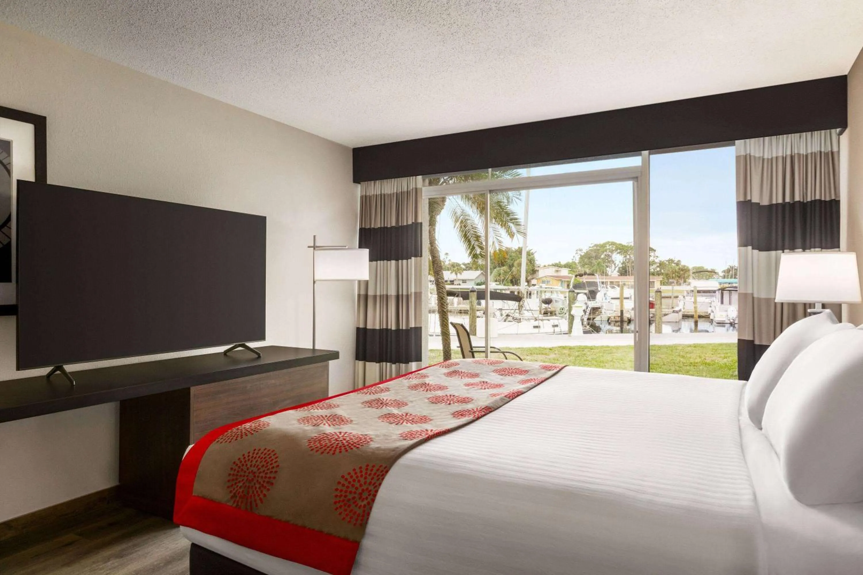 Photo of the whole room, Bed in Ramada by Wyndham Sarasota Waterfront