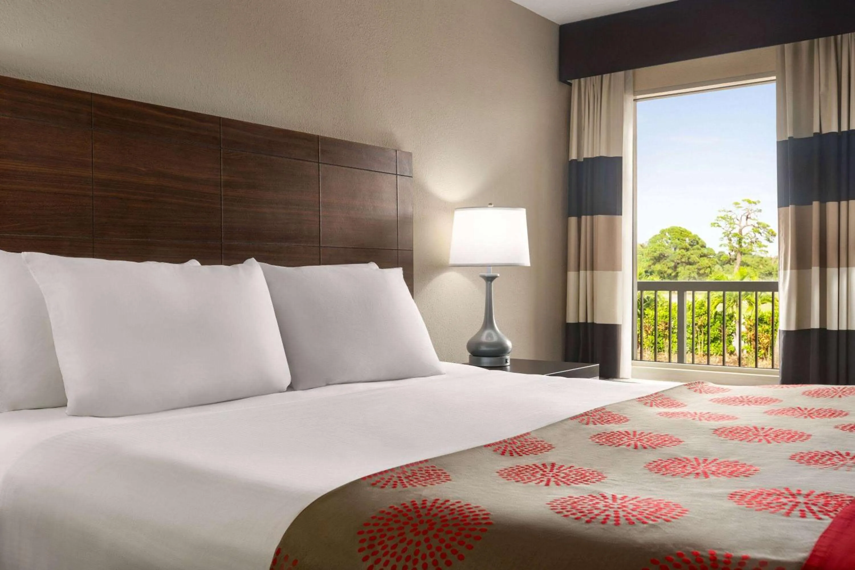 Photo of the whole room, Bed in Ramada by Wyndham Sarasota Waterfront