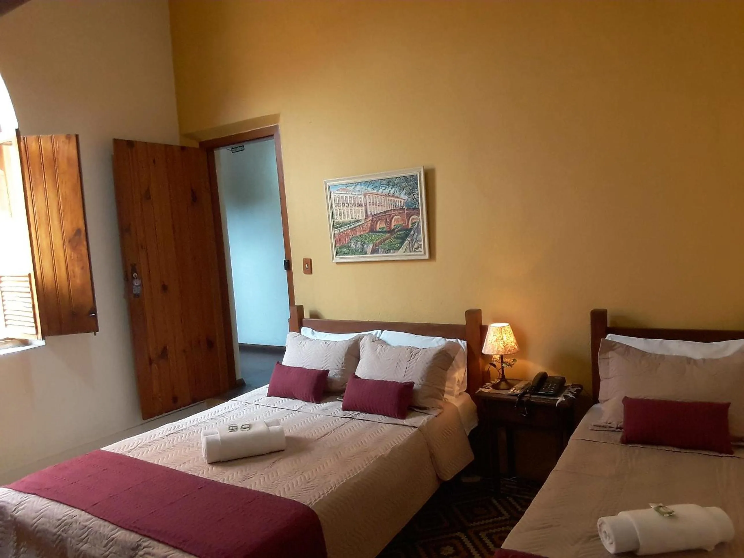 Bed in Pousada Estação do Trem