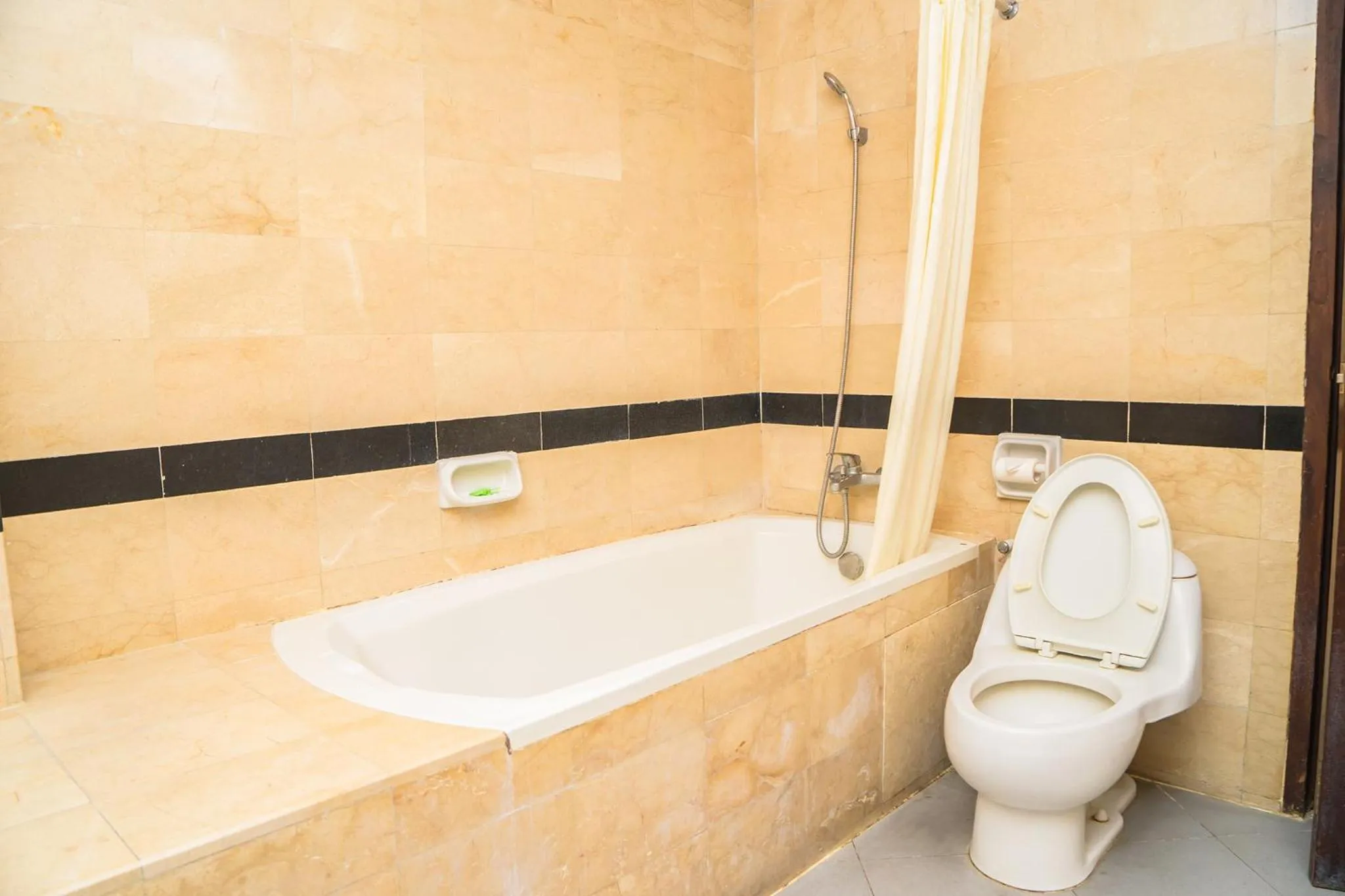 Bathroom in Hotel Puri Ayu