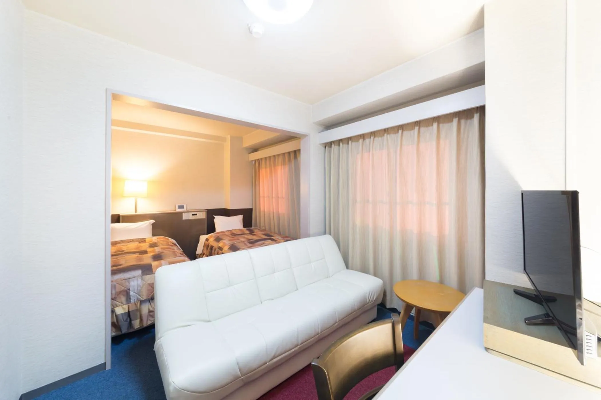 Photo of the whole room in Hotel Sunrise Inn