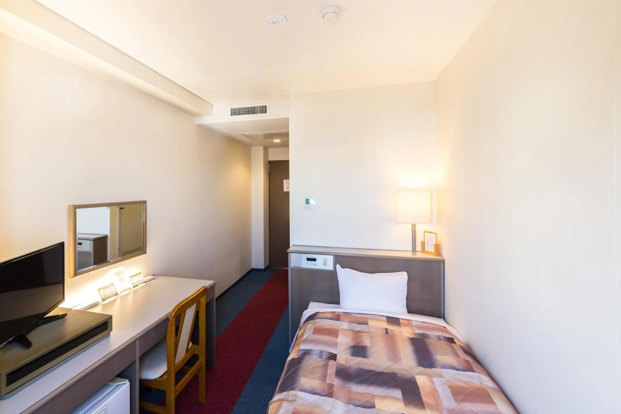 Photo of the whole room in Hotel Sunrise Inn