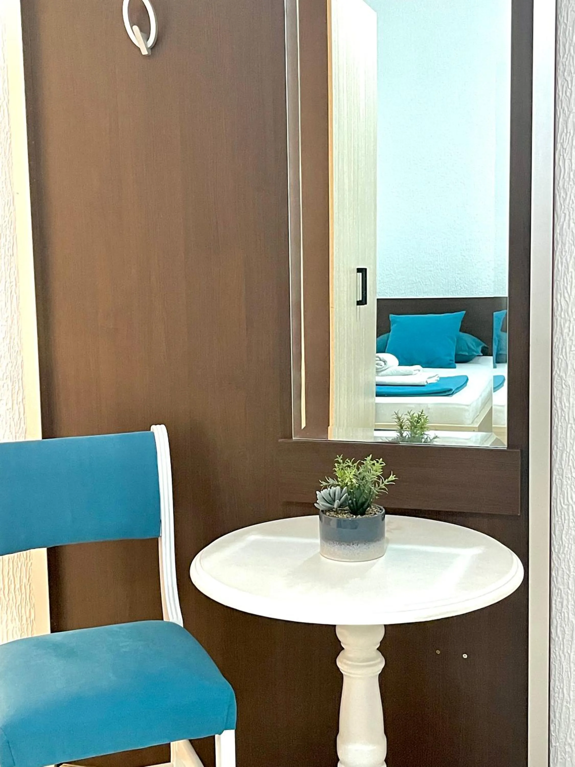 Seating area, Bed in Monte Perla Residence