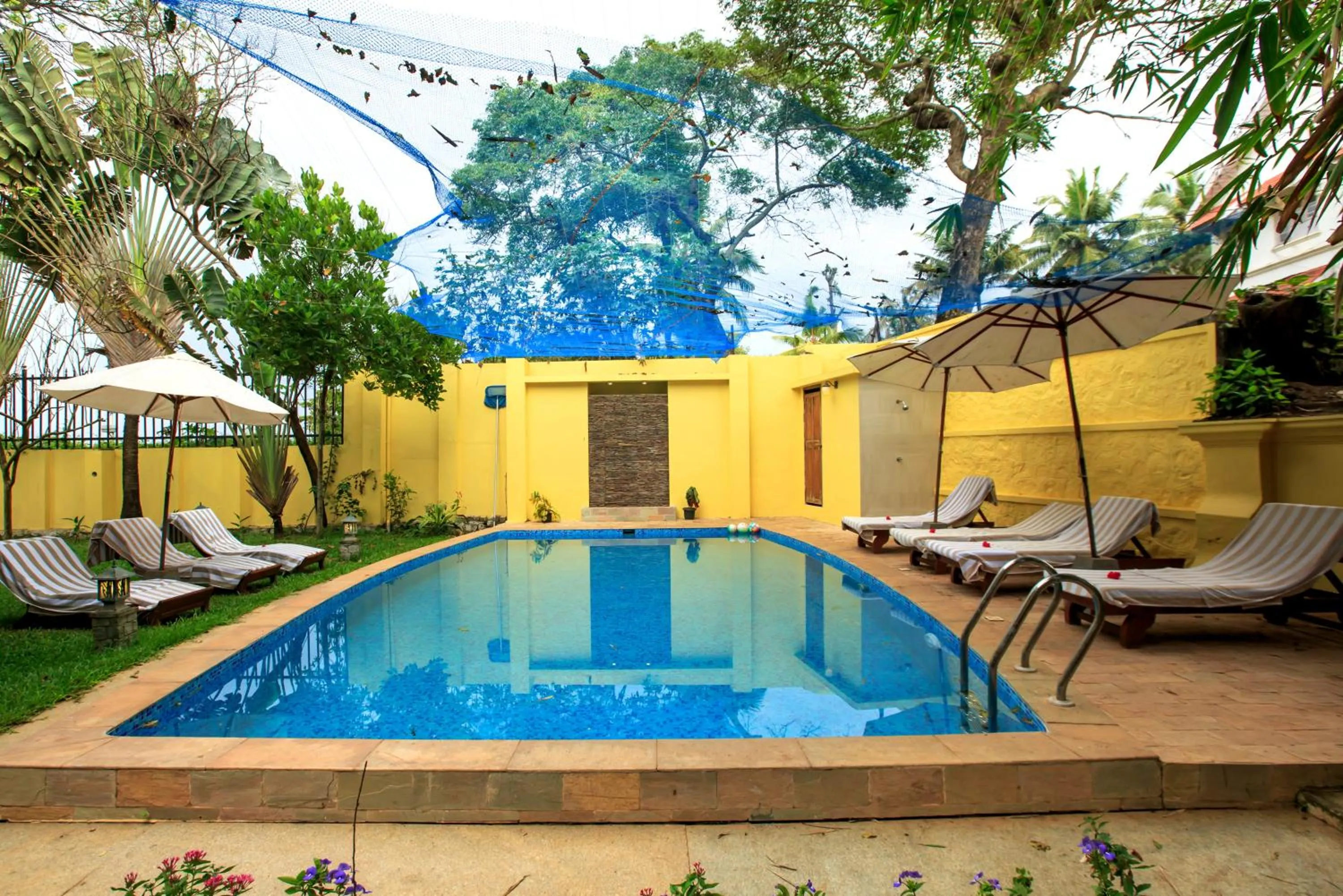 Swimming pool in Amritara The Poovath Beachfront Heritage, Fort Kochi