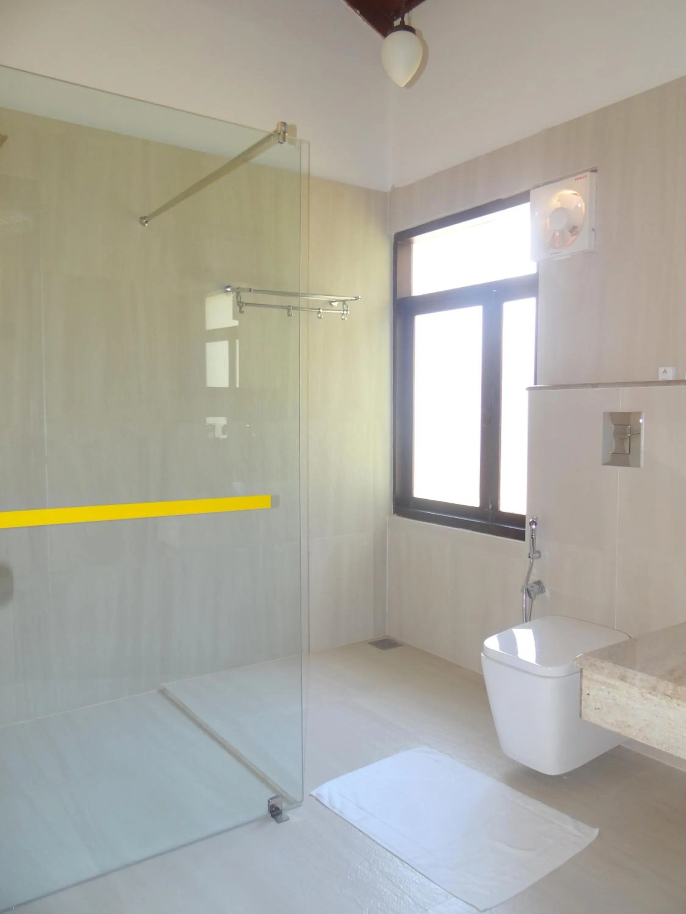 Toilet in Amritara The Poovath Beachfront Heritage, Fort Kochi