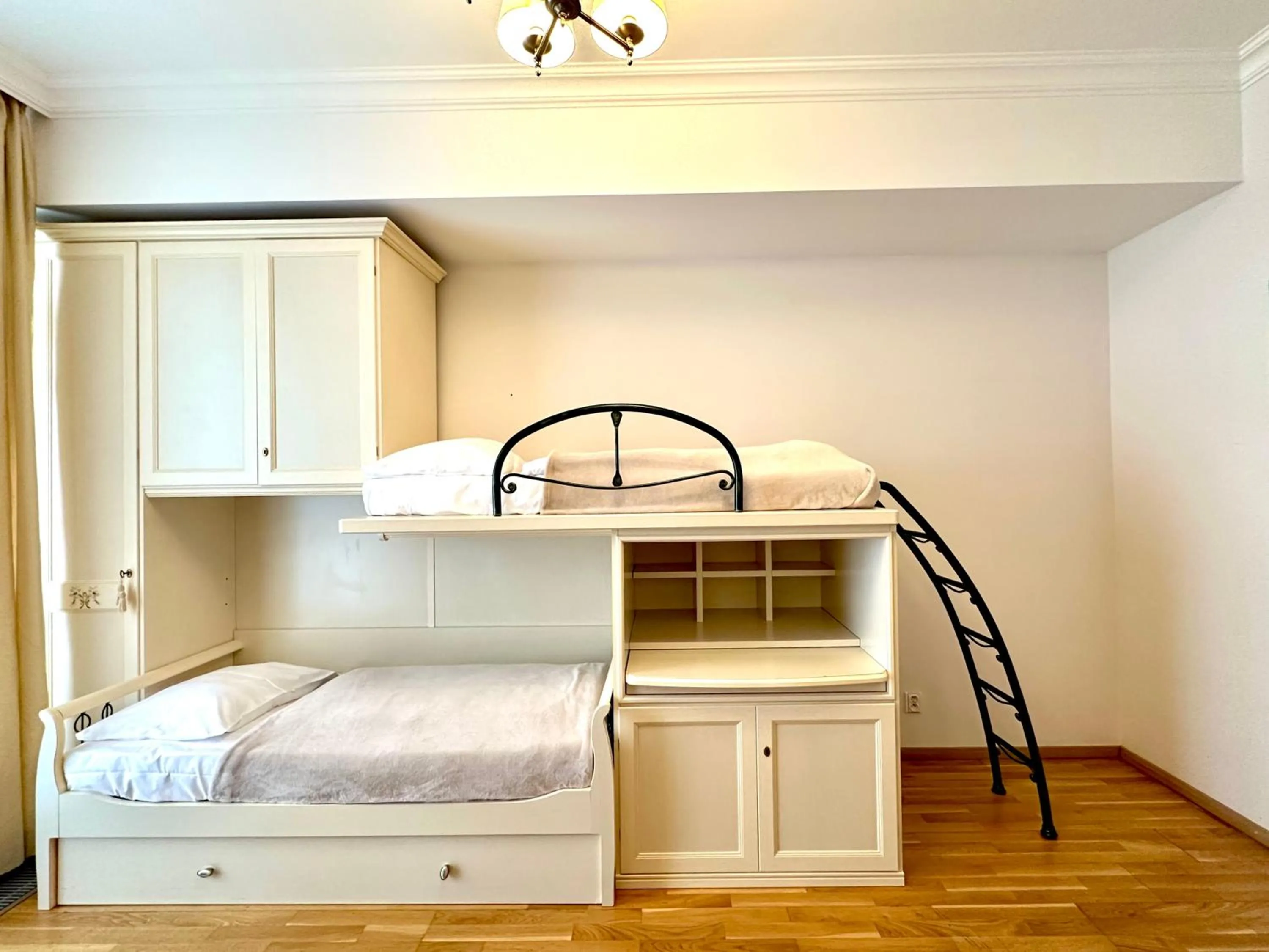 Bed in Slunecni Lazne Apartments