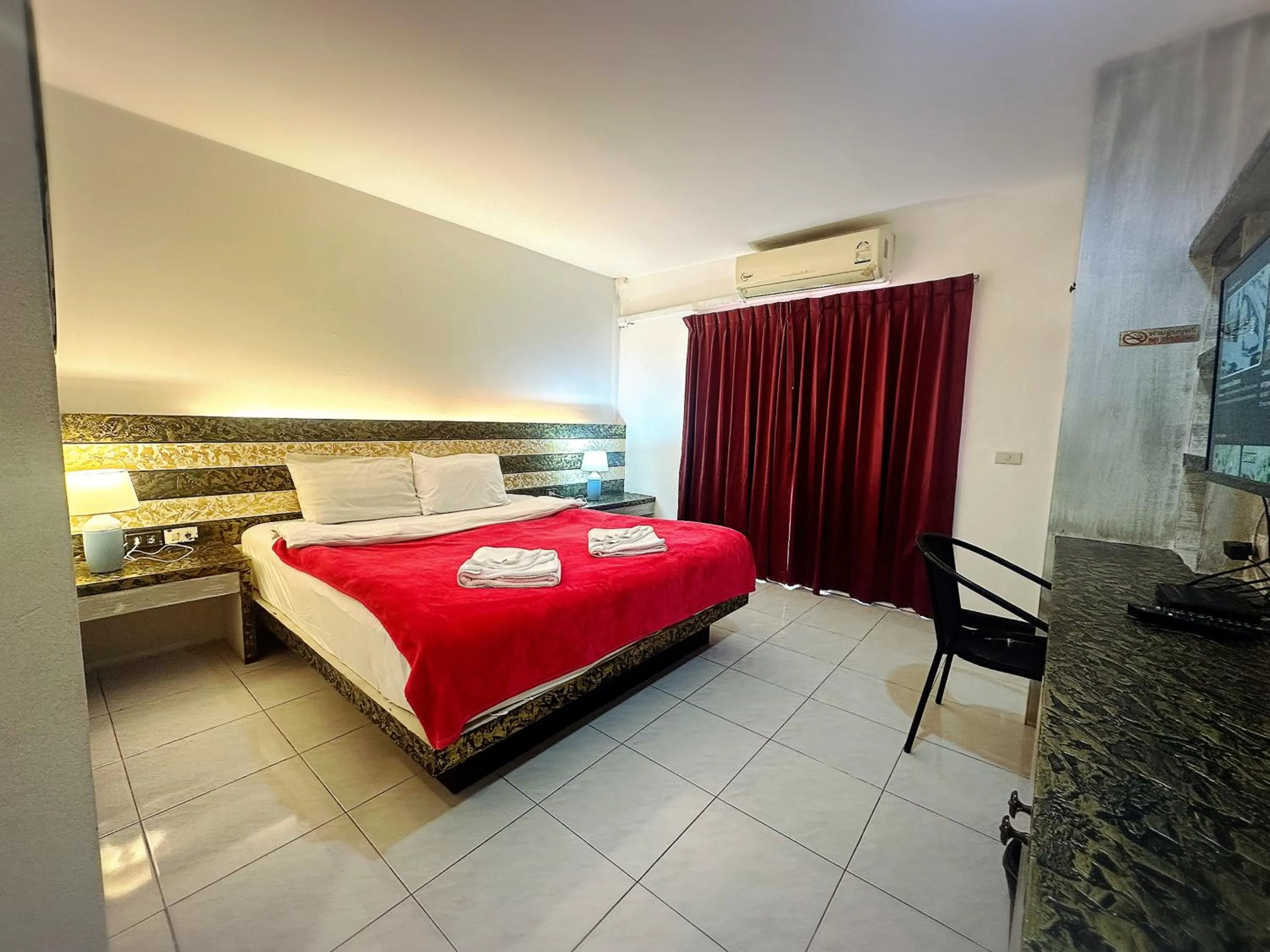 Bed in The Shades Hotel 50 meter Beach Front