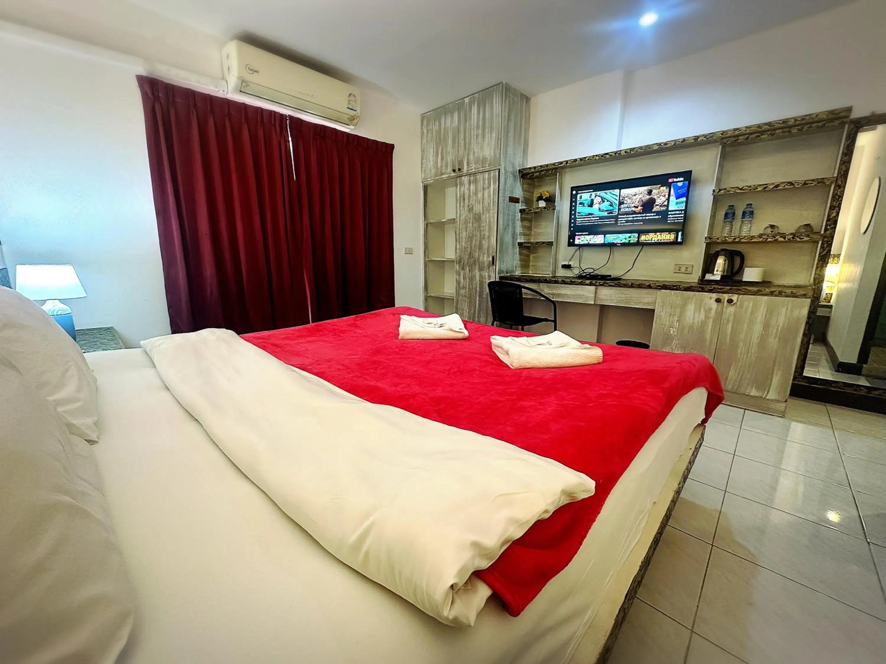 Bed in The Shades Hotel 50 meter Beach Front