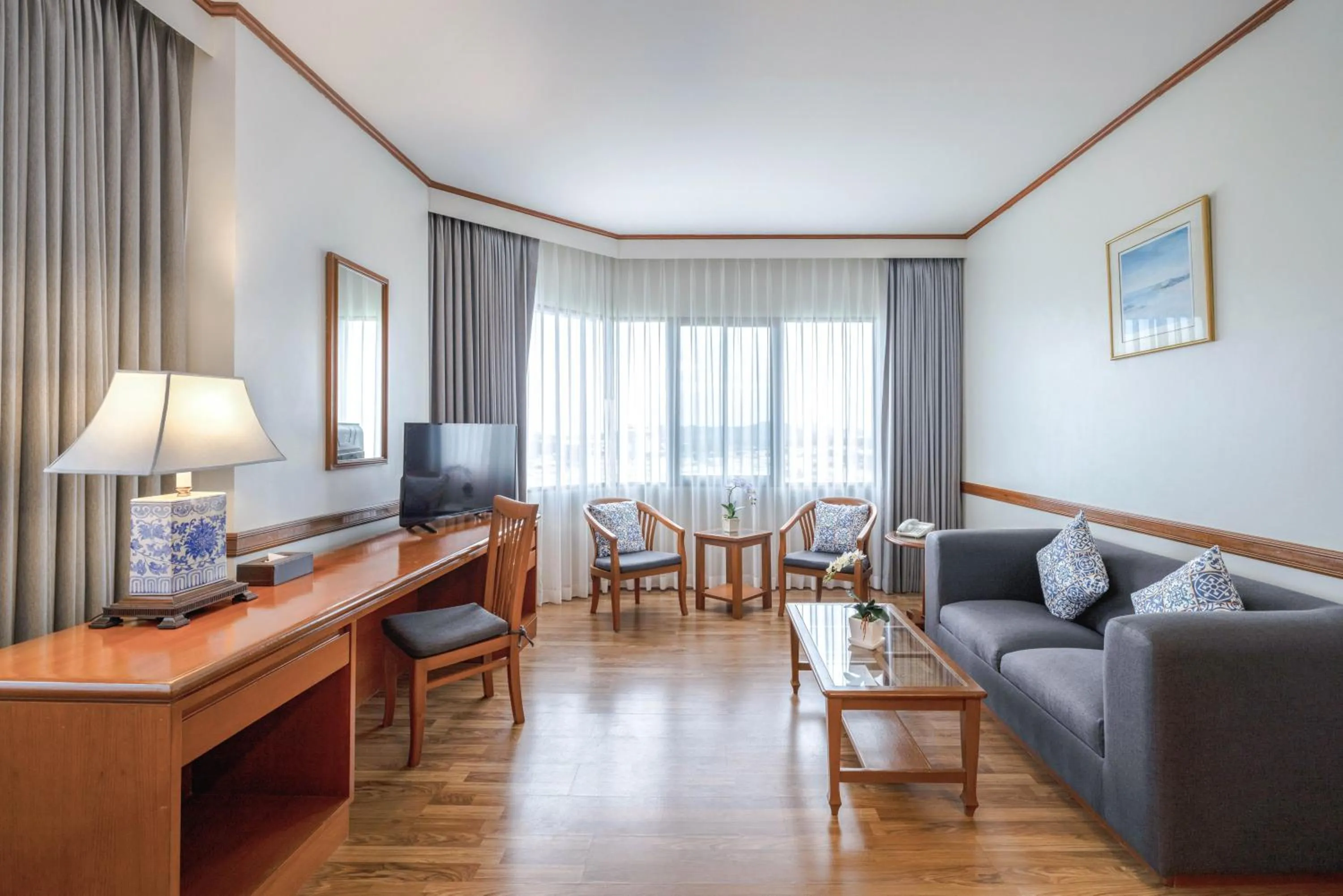 Living room in Royal Phuket City Hotel