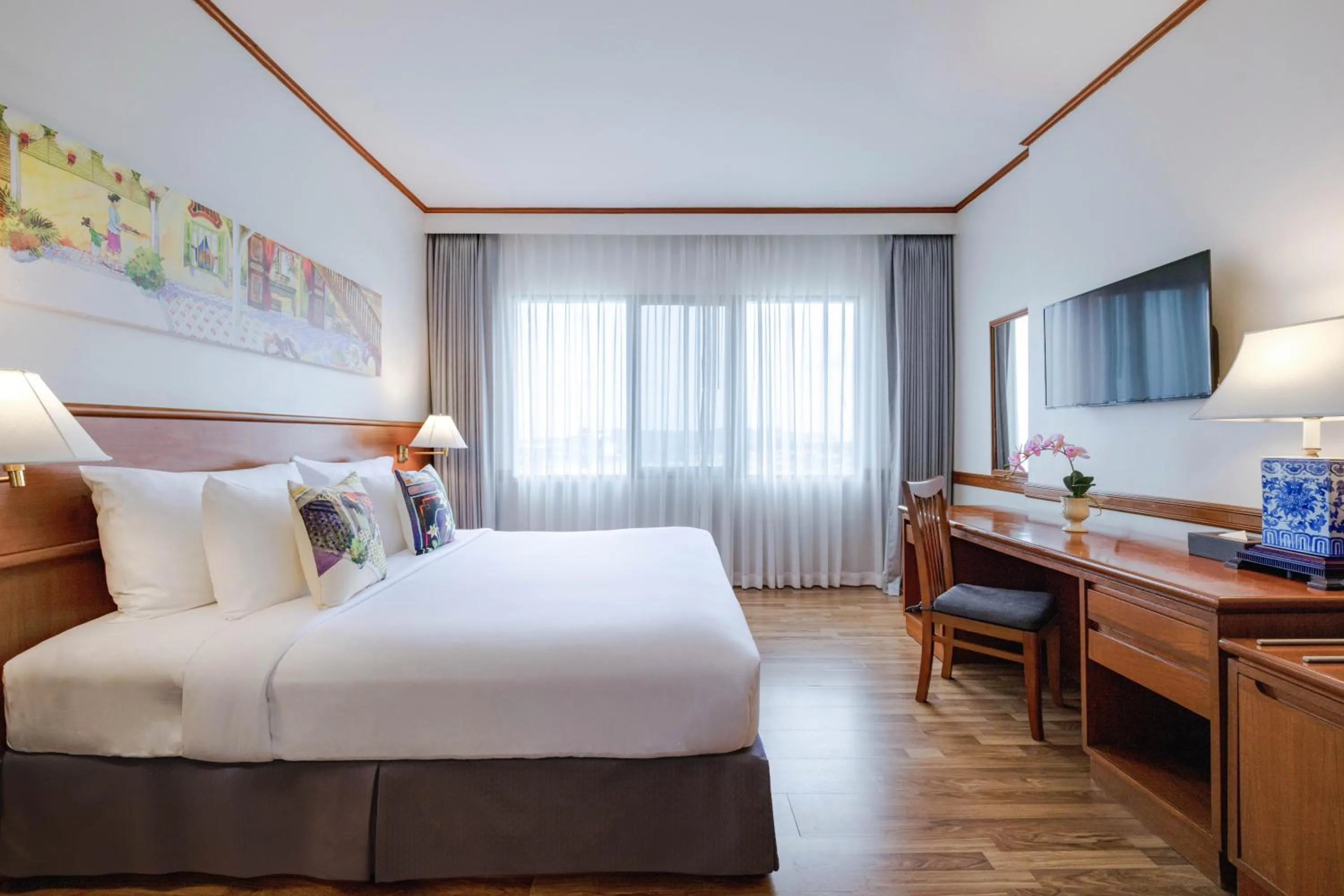 Bed in Royal Phuket City Hotel