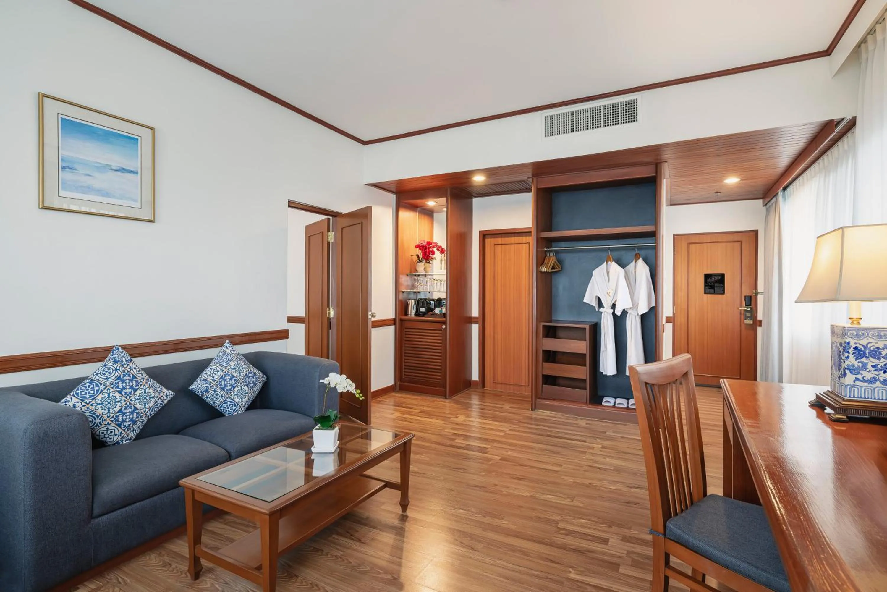 Living room in Royal Phuket City Hotel