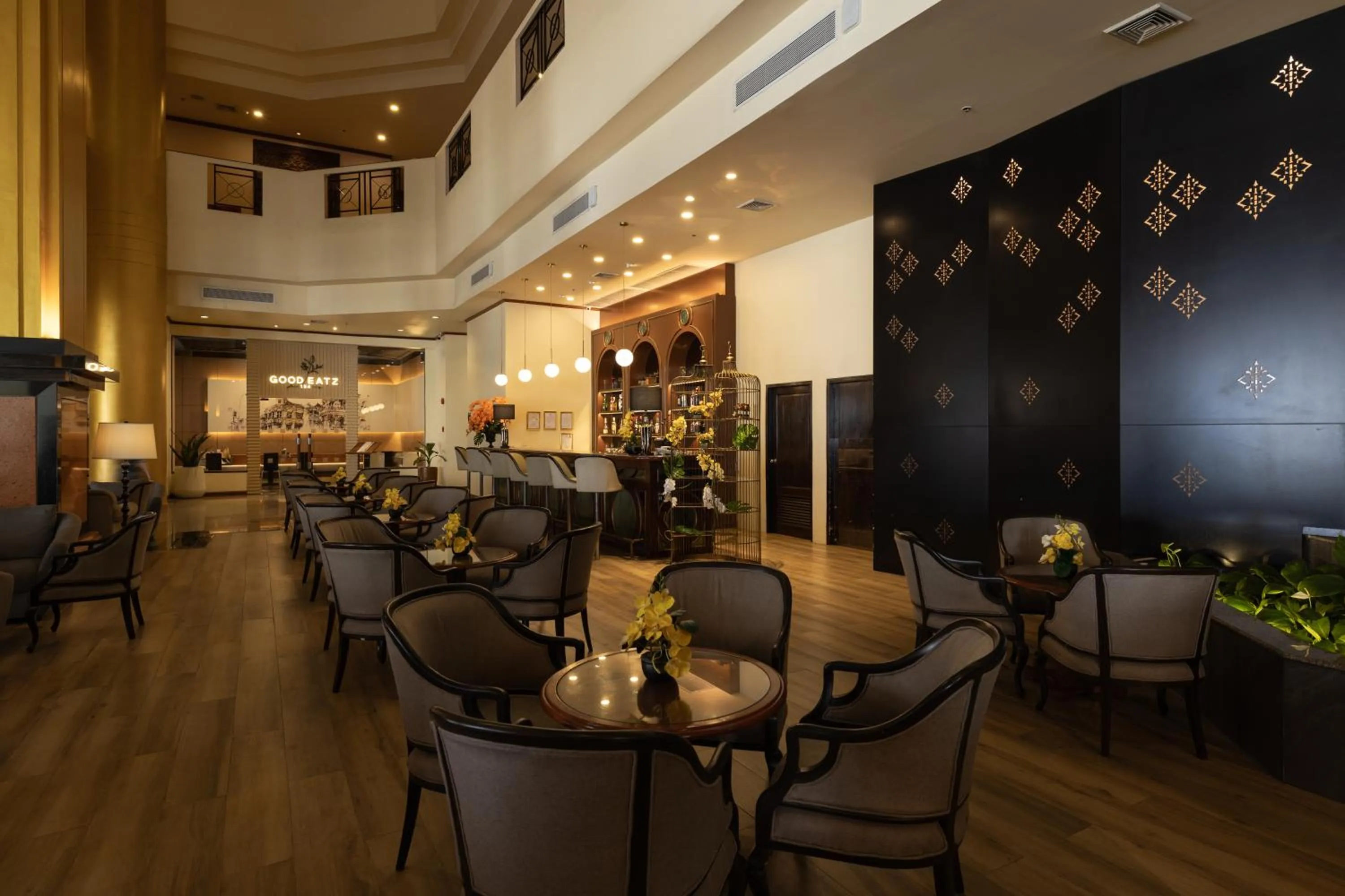 Communal lounge/ TV room in Royal Phuket City Hotel