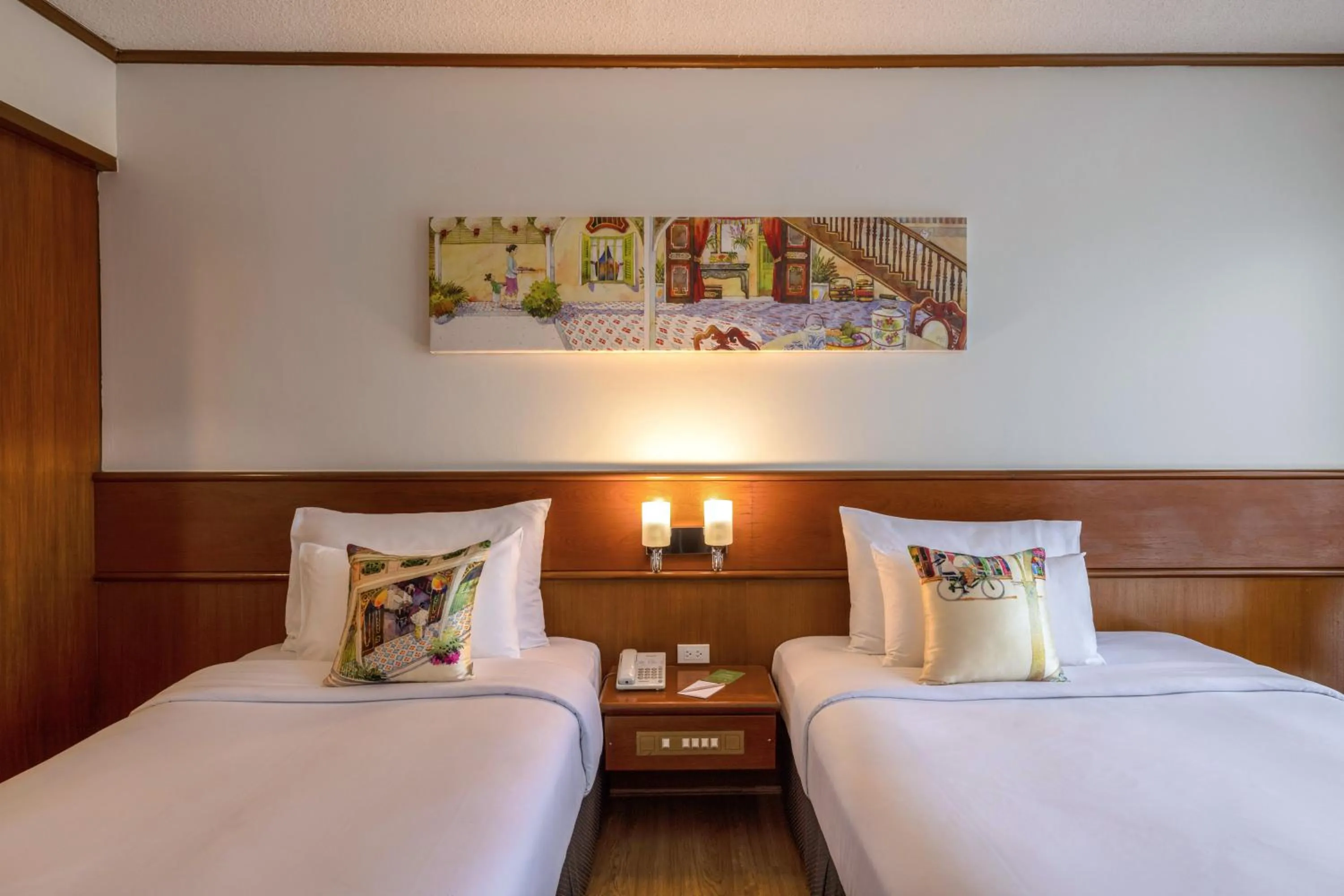 Bed in Royal Phuket City Hotel