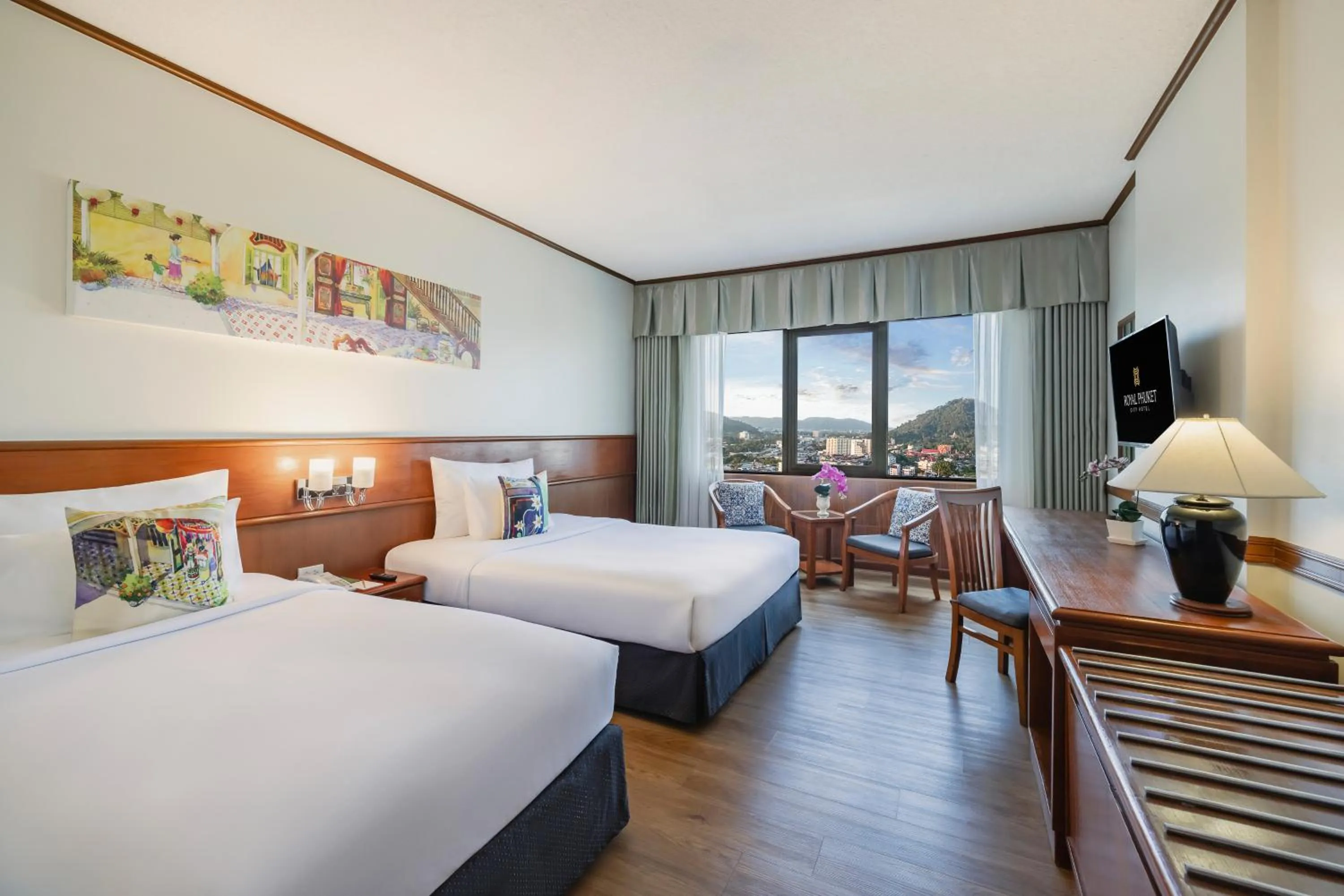 Bed in Royal Phuket City Hotel