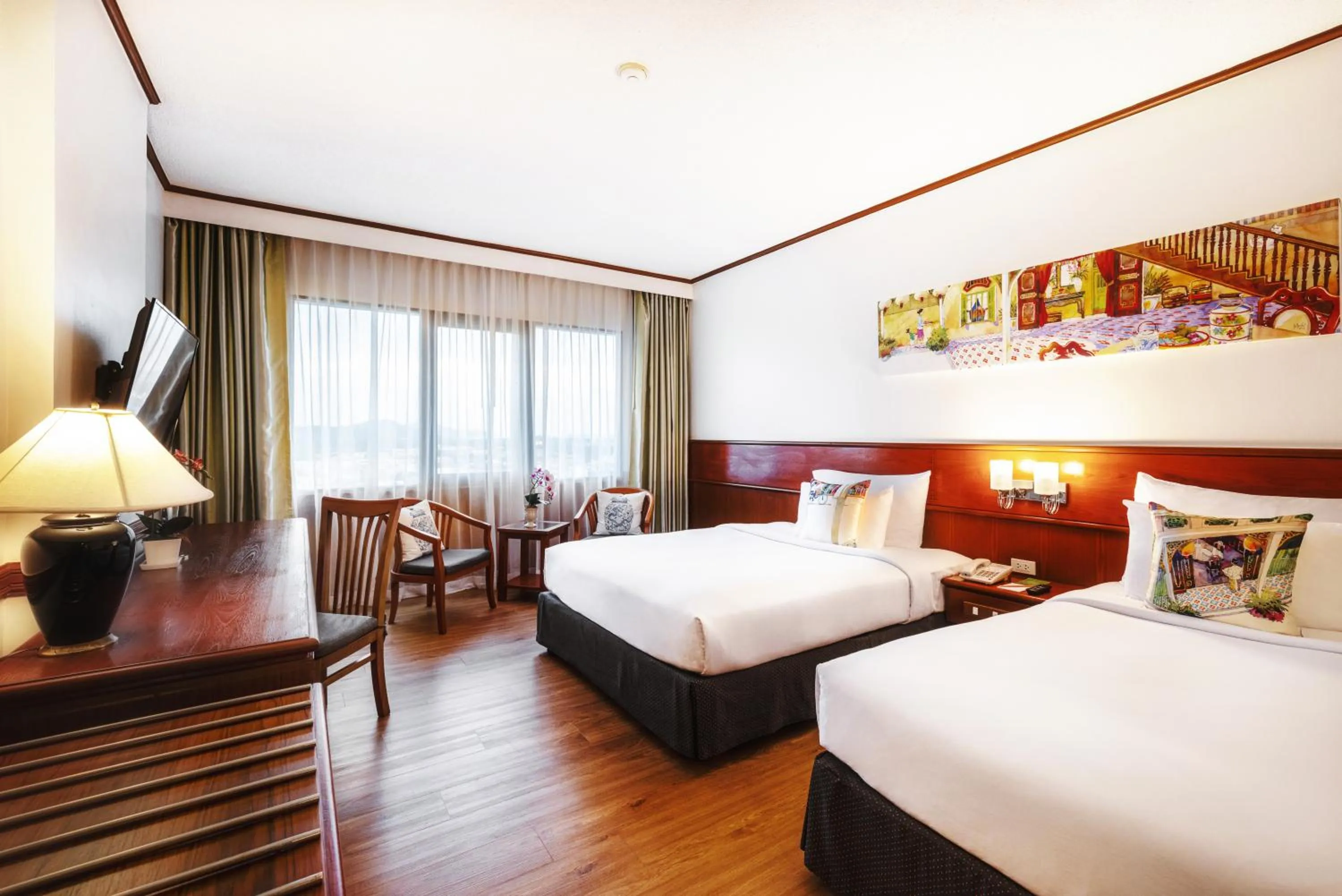 Bed in Royal Phuket City Hotel