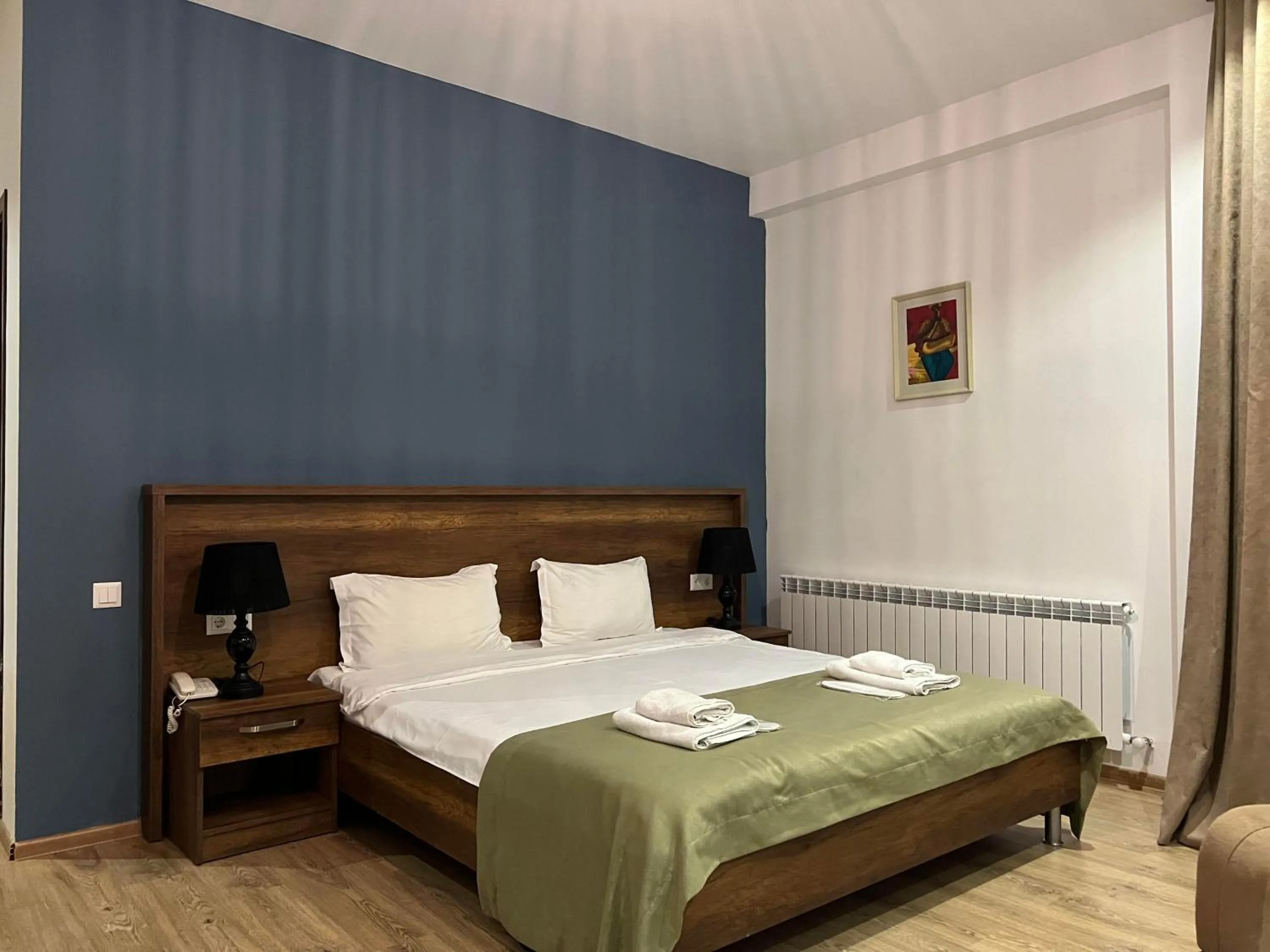 Bed in Hotel King Tom