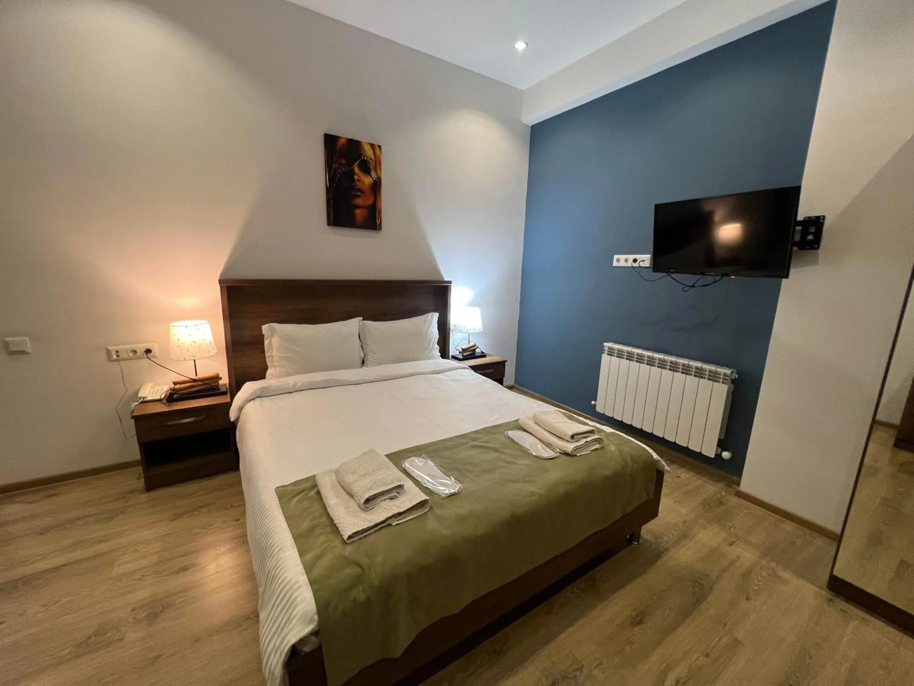 Bed in Hotel King Tom