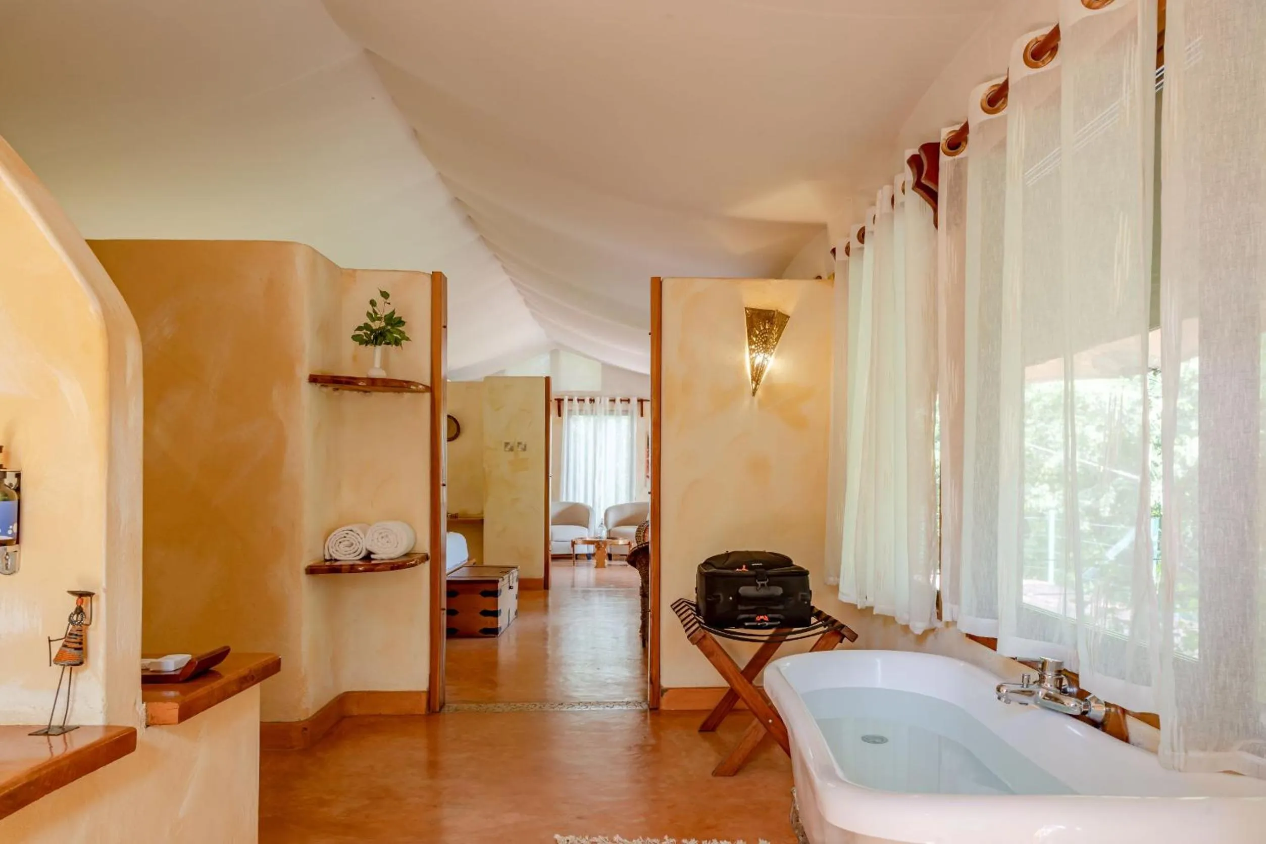Bathroom, Bed in PrideInn Mara Camp & Cottages