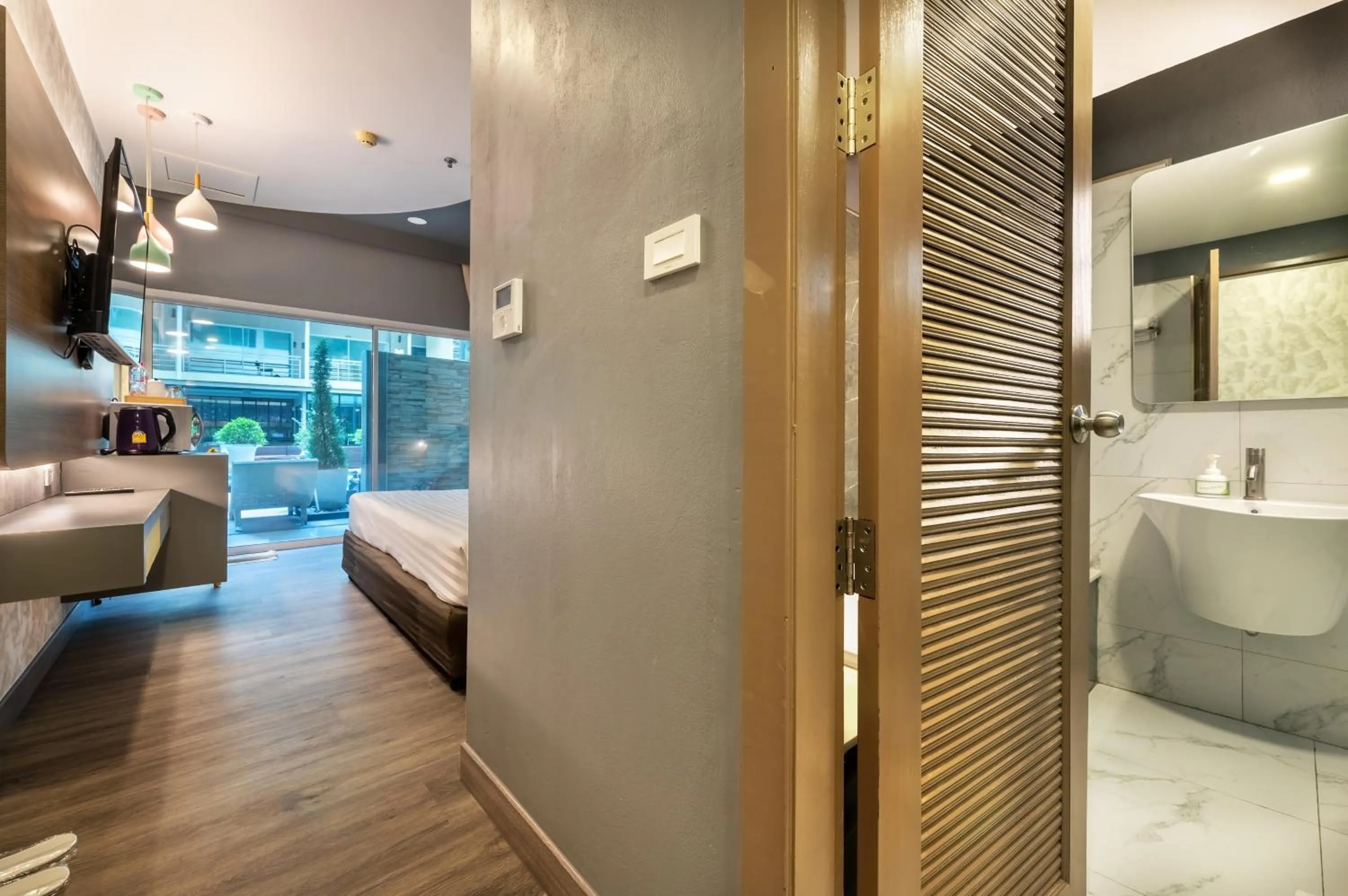 Bed in Qiu Hotel Sukhumvit - BTS On Nut Station